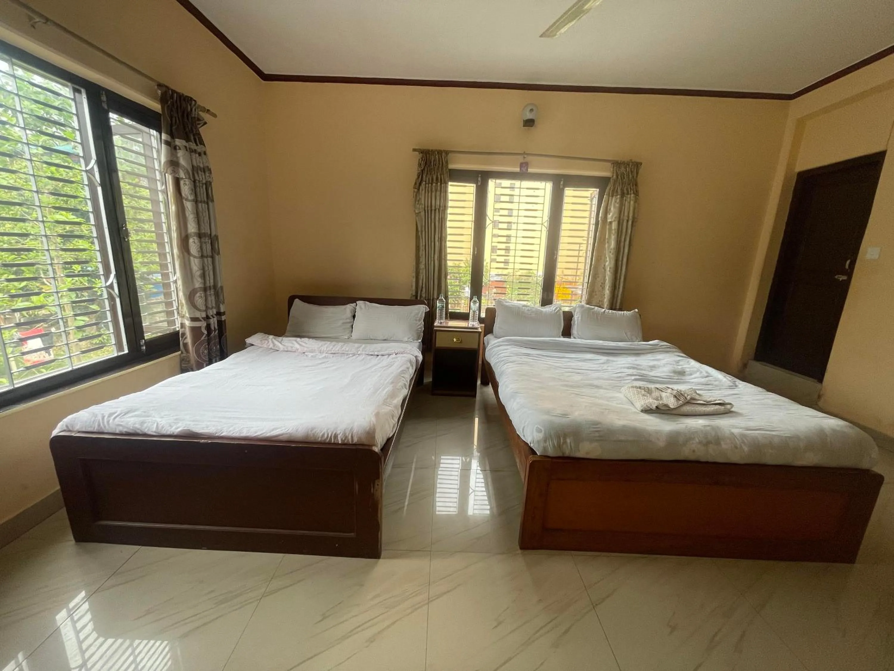 Bed in Hotel Peace Ganga Inn