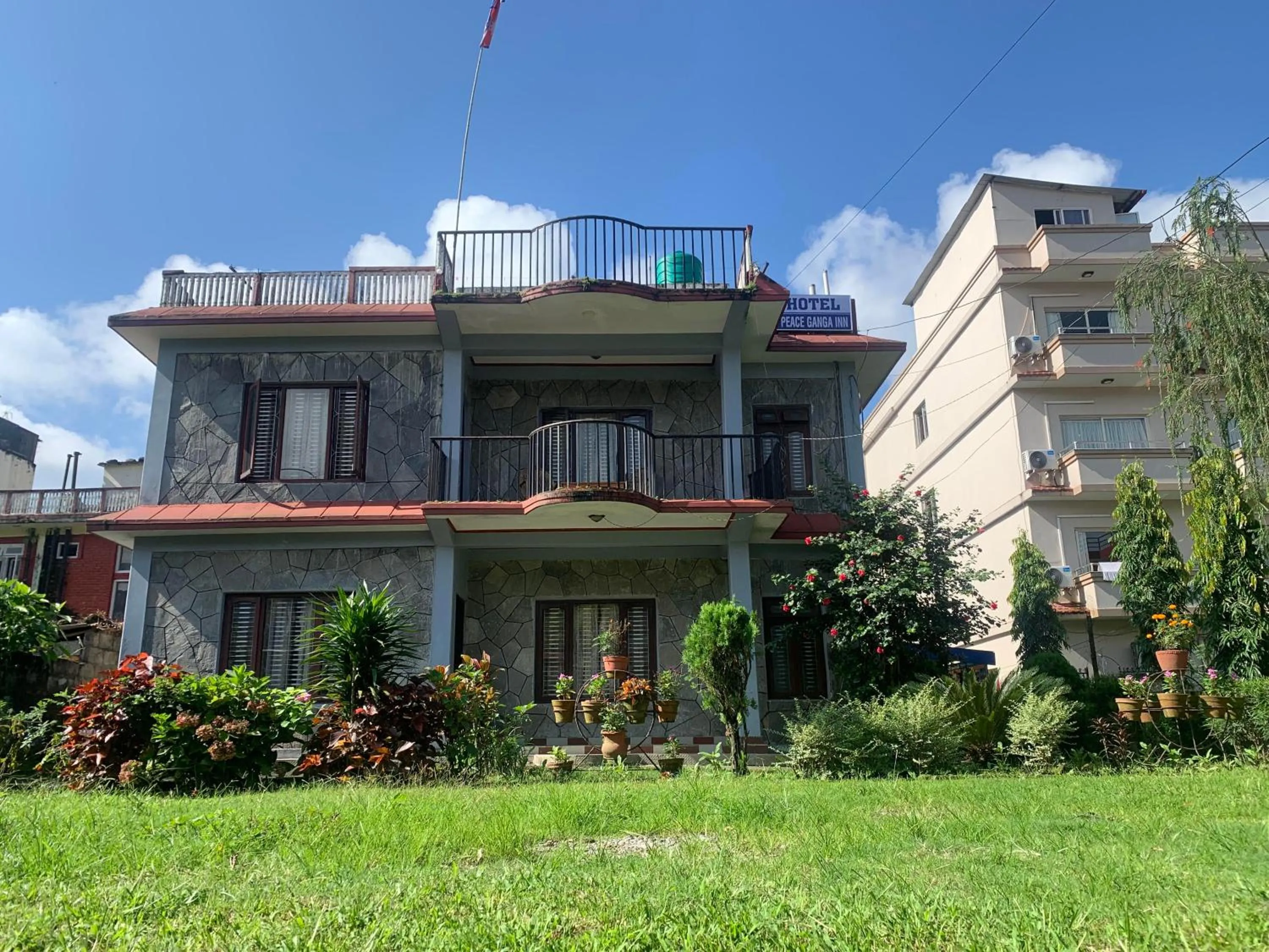 Property building in Hotel Peace Ganga Inn