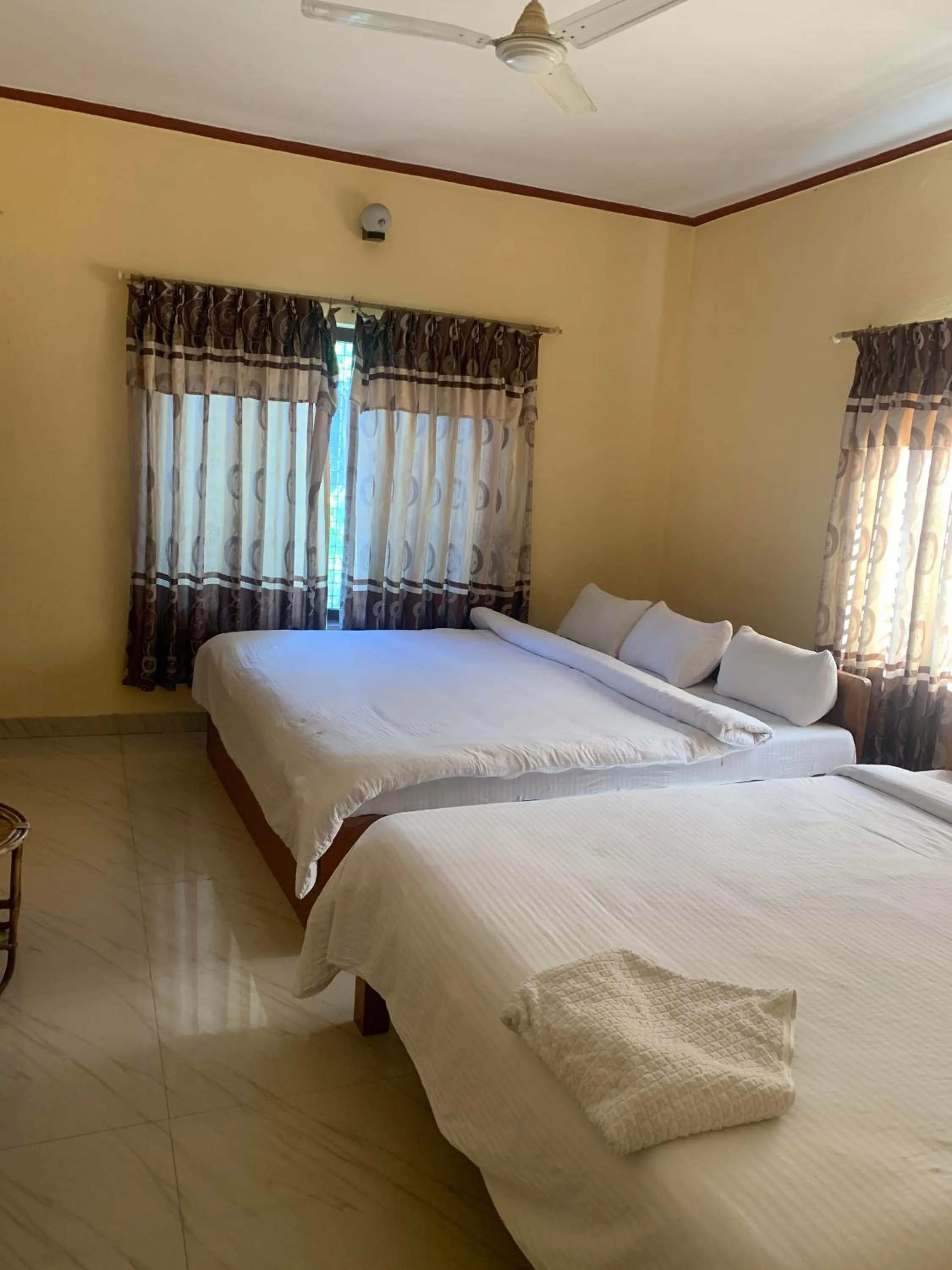 Photo of the whole room, Bed in Hotel Peace Ganga Inn