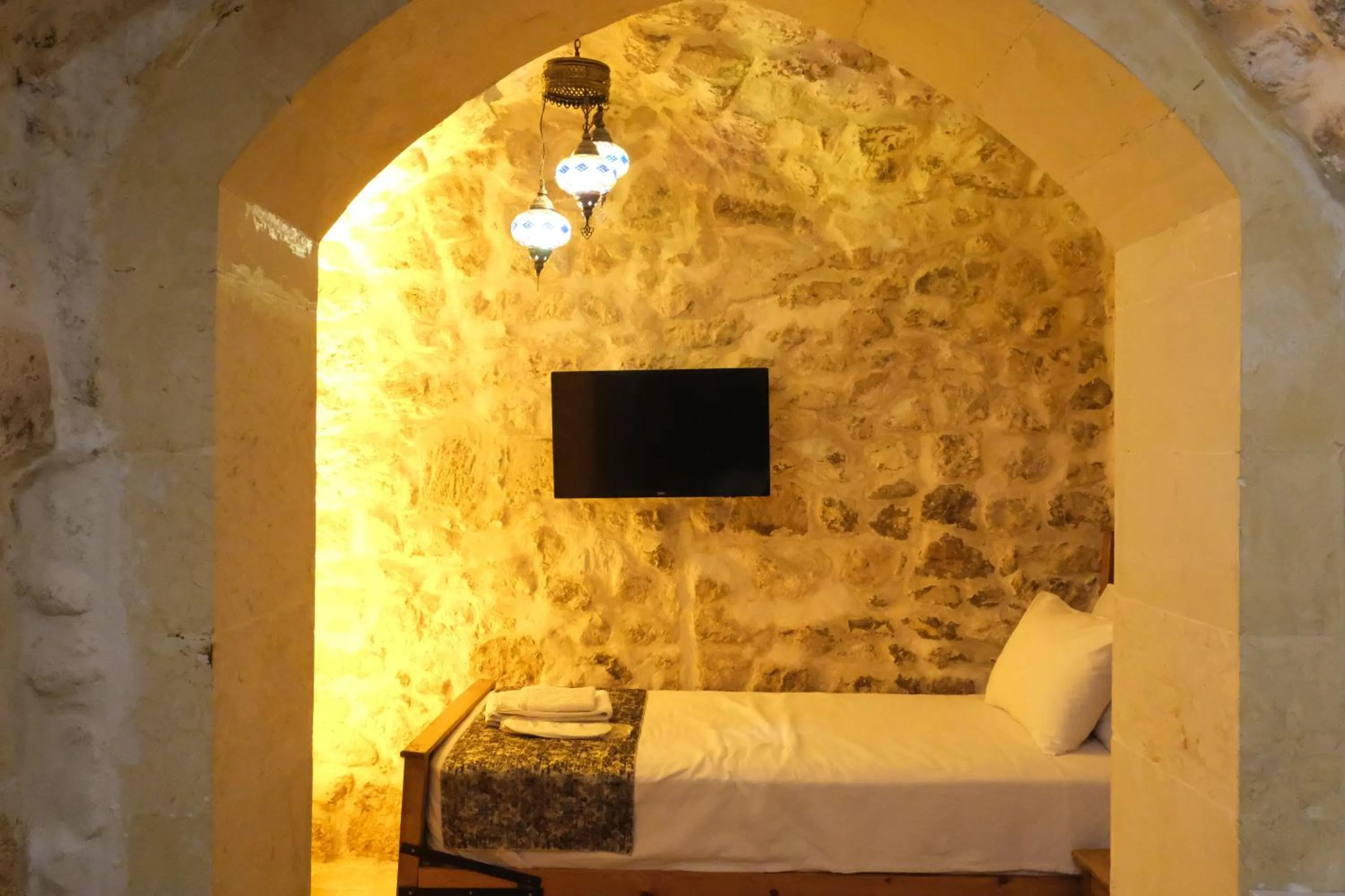 Bed in BABIL ANTIQUE HOTEL