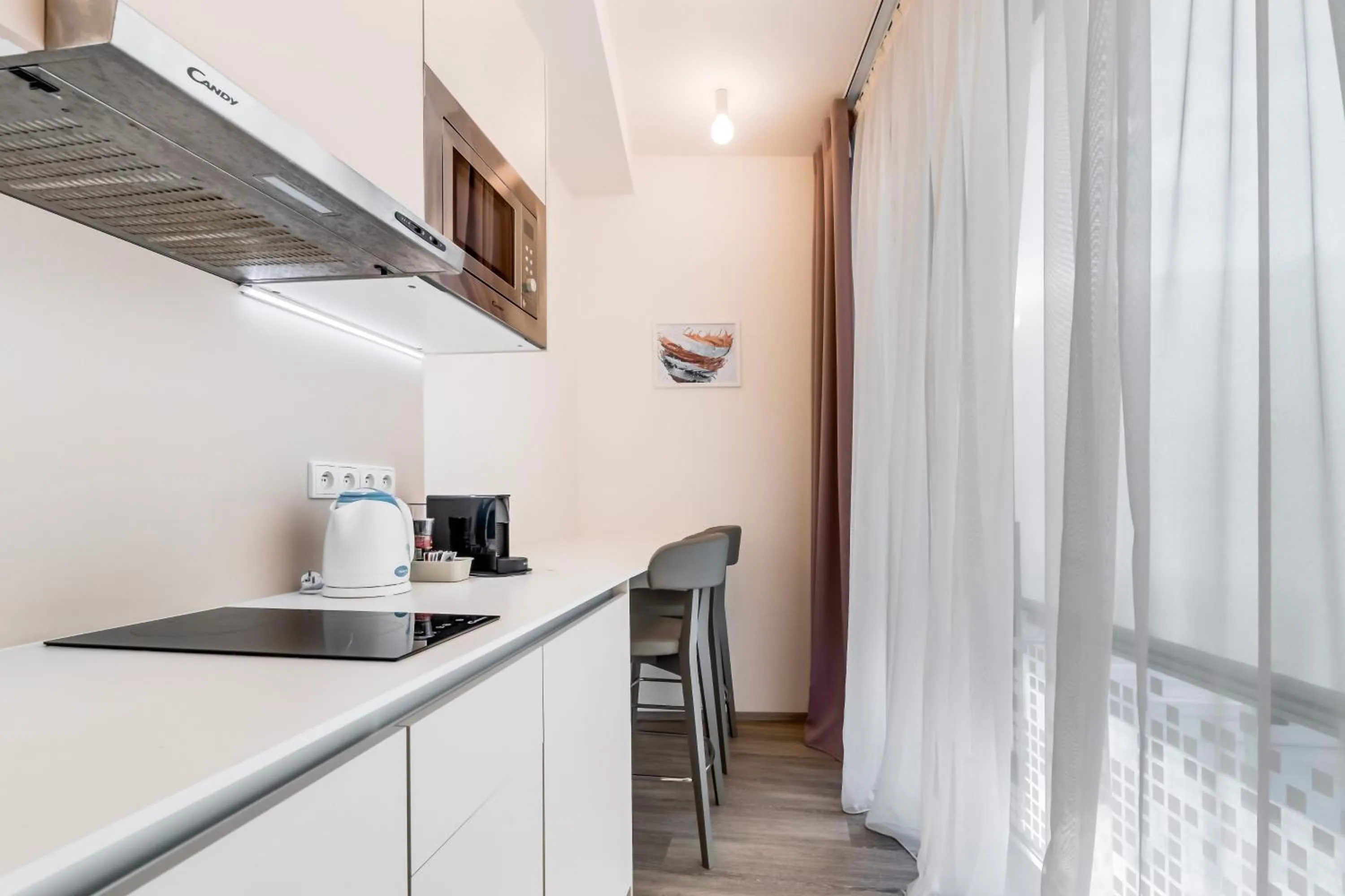 Kitchen or kitchenette in Kora Apartments
