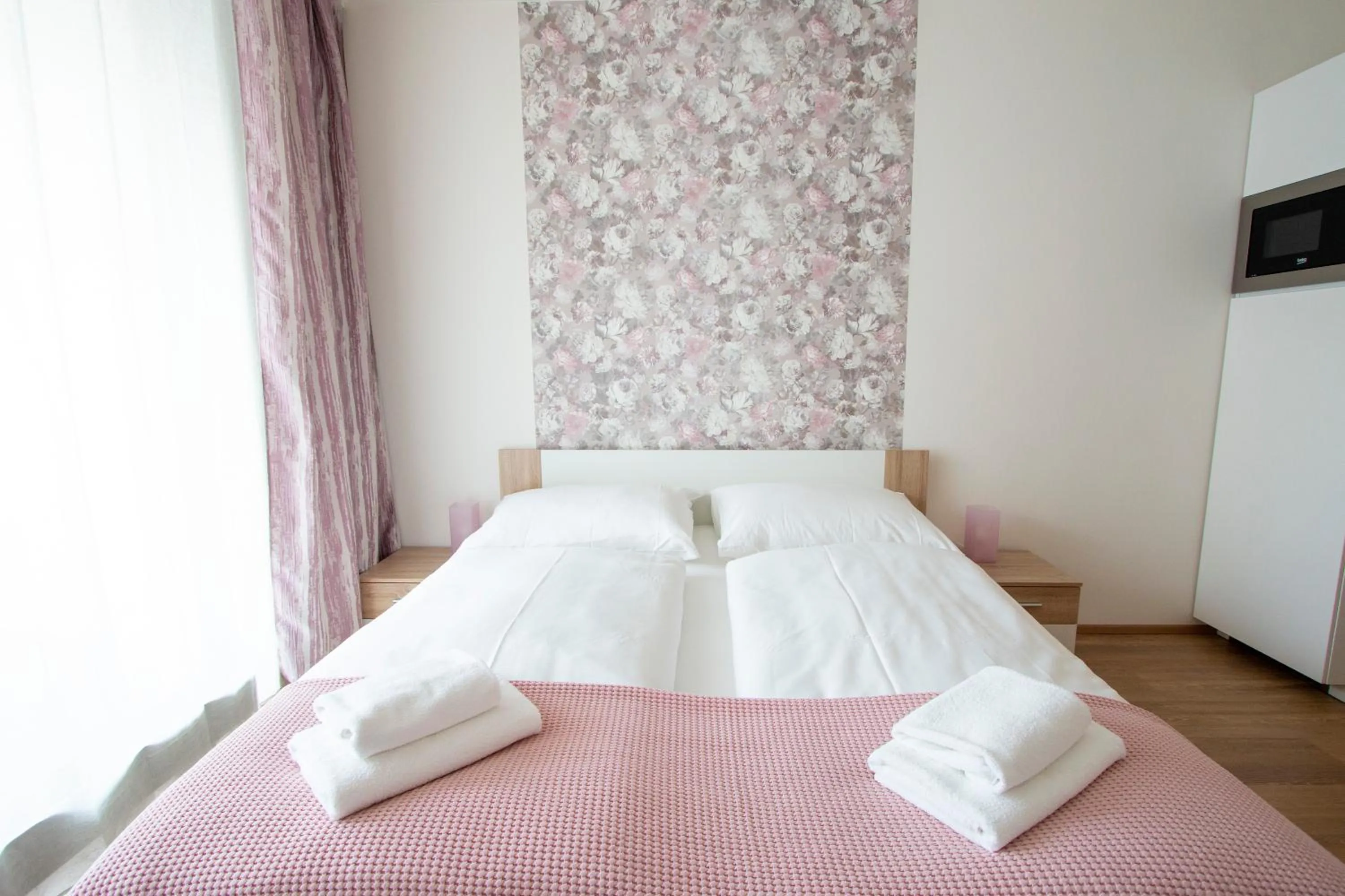 Bed in Kora Apartments