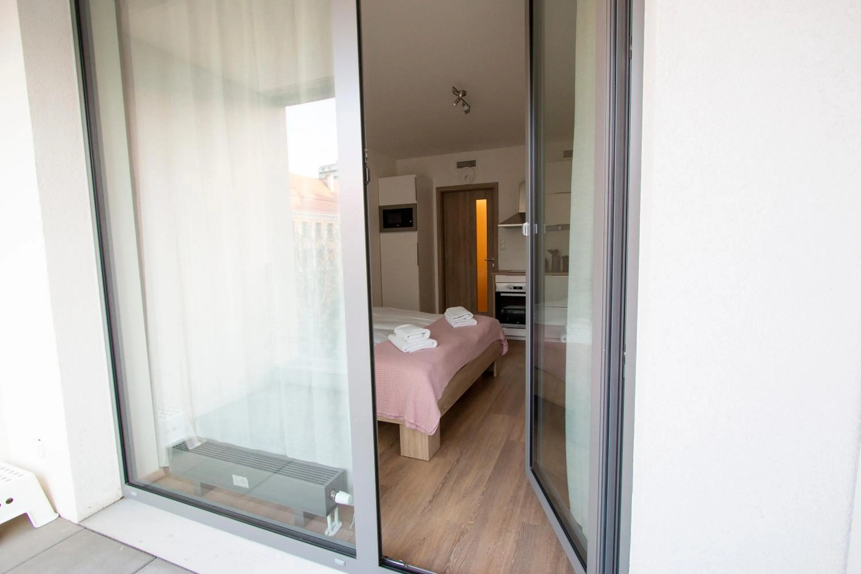 Bed in Kora Apartments