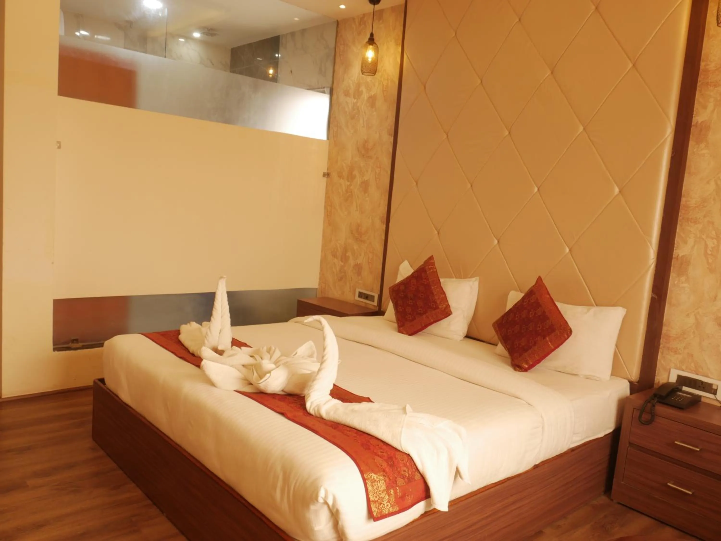 Bedroom in THE TRIUMPH HOTEL