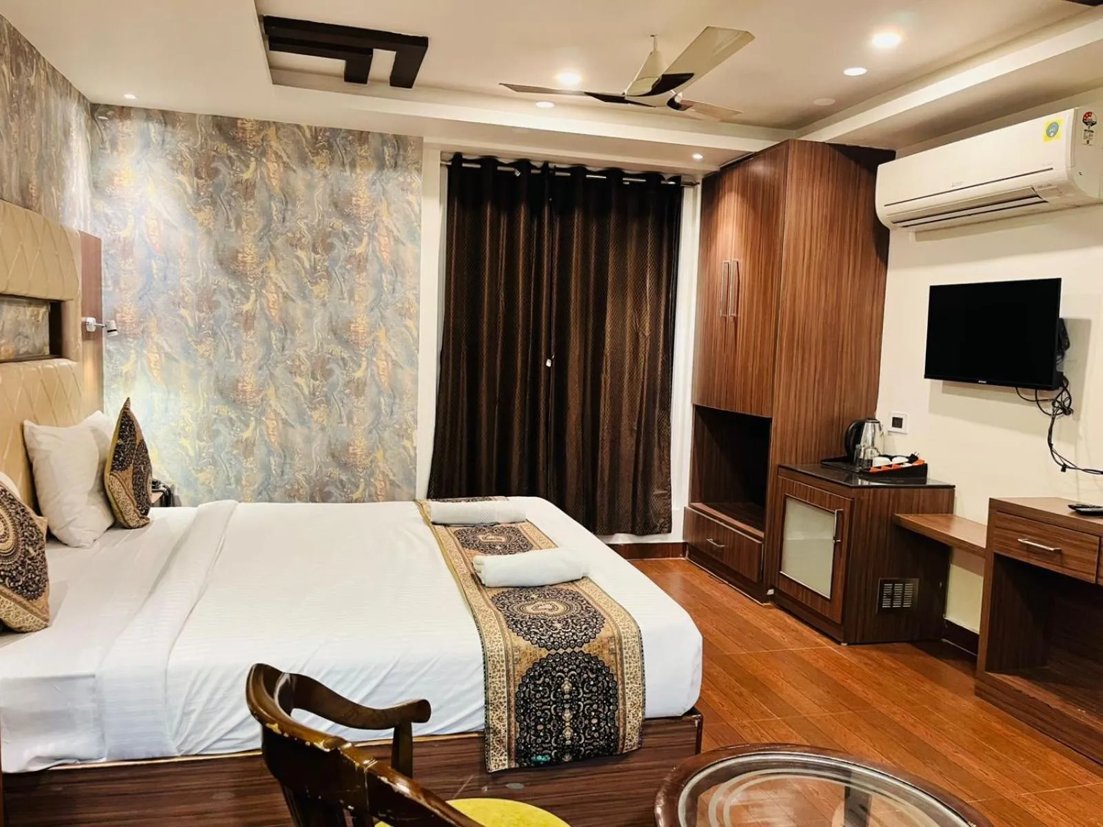 Bed in THE TRIUMPH Hotel