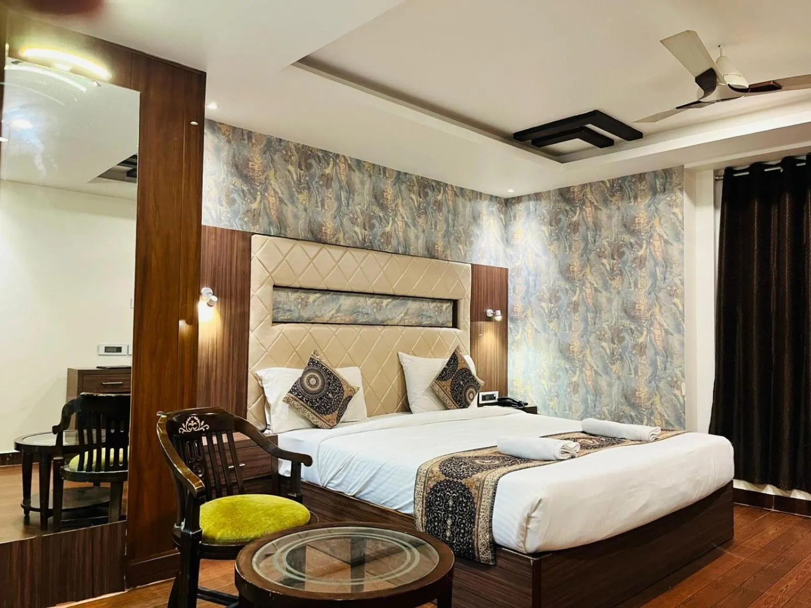 Bed in THE TRIUMPH Hotel