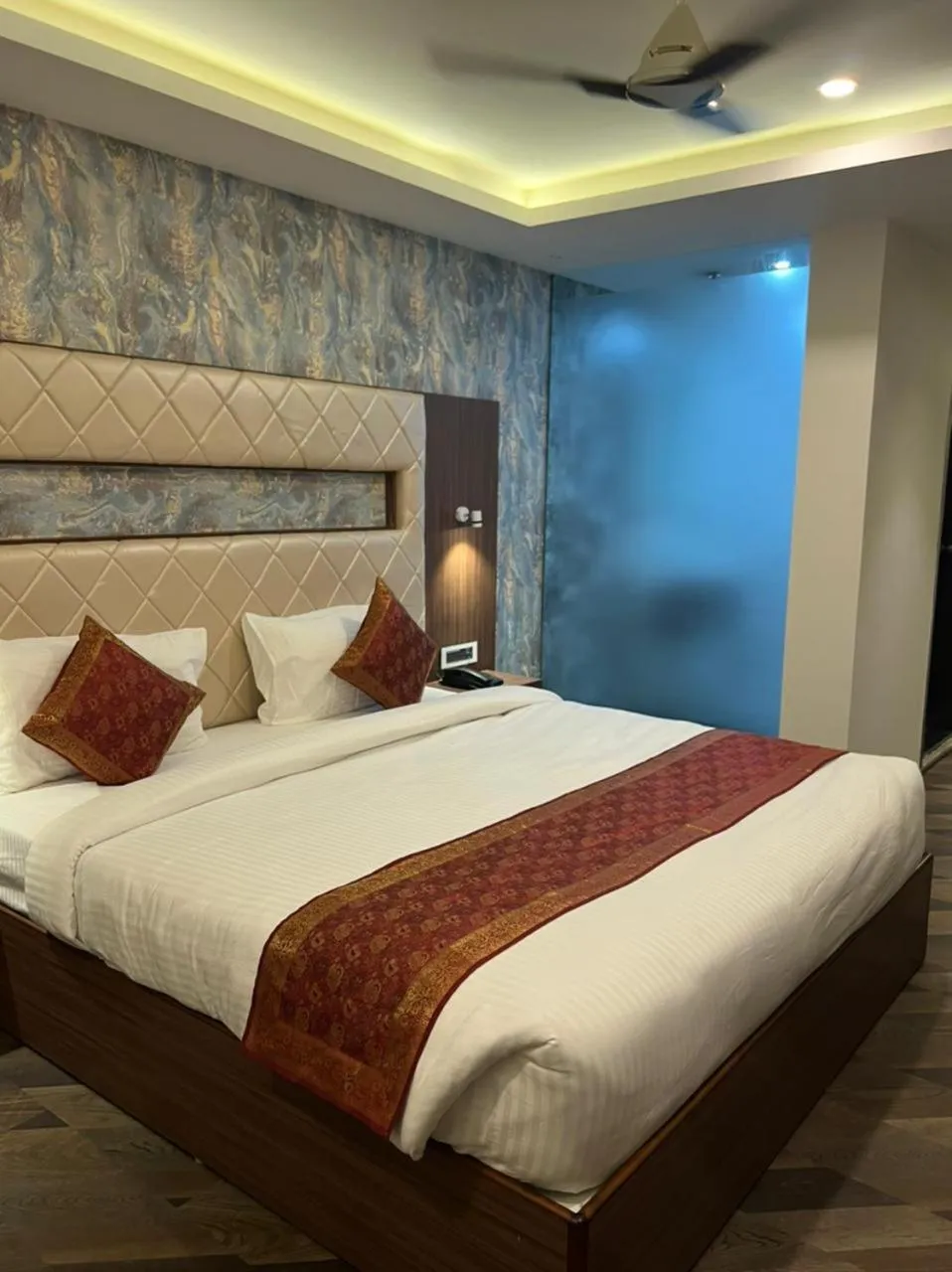 Bedroom in THE TRIUMPH HOTEL