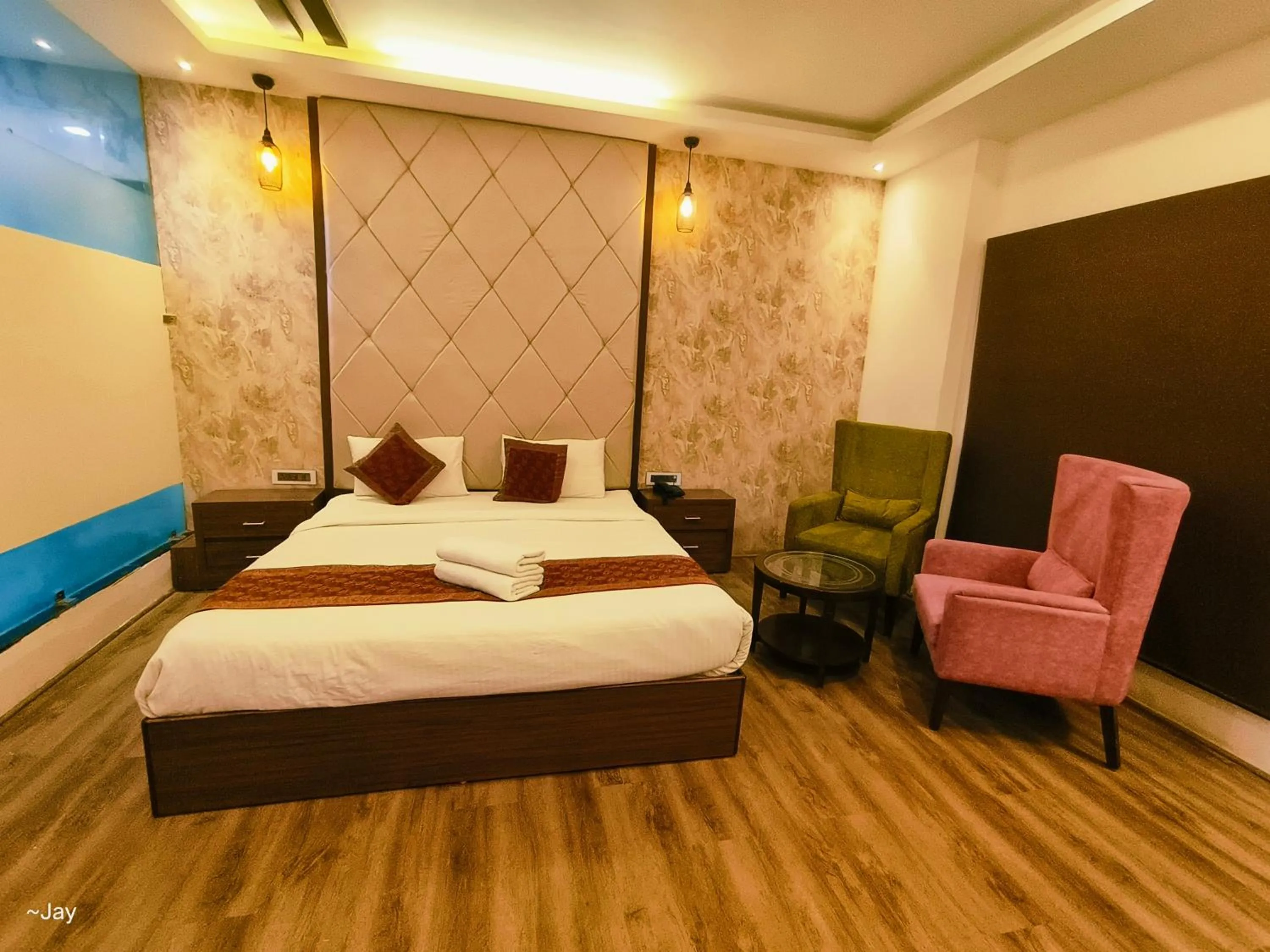 Bedroom in THE TRIUMPH HOTEL