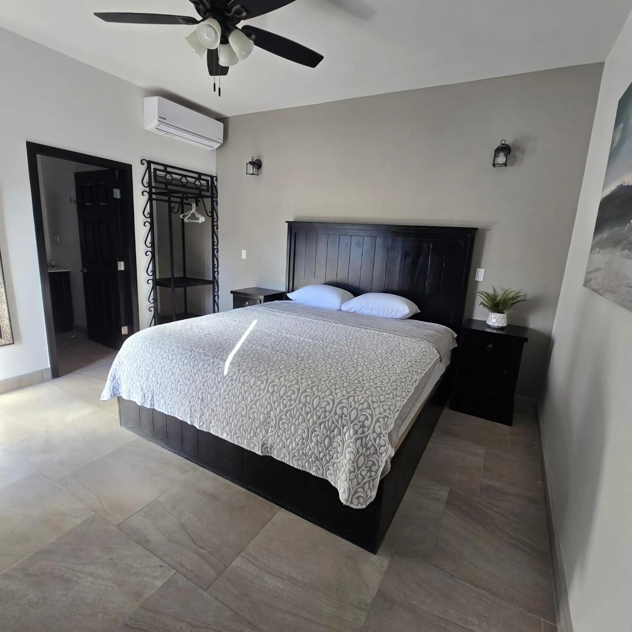 Bed in Playas Hotel Suites