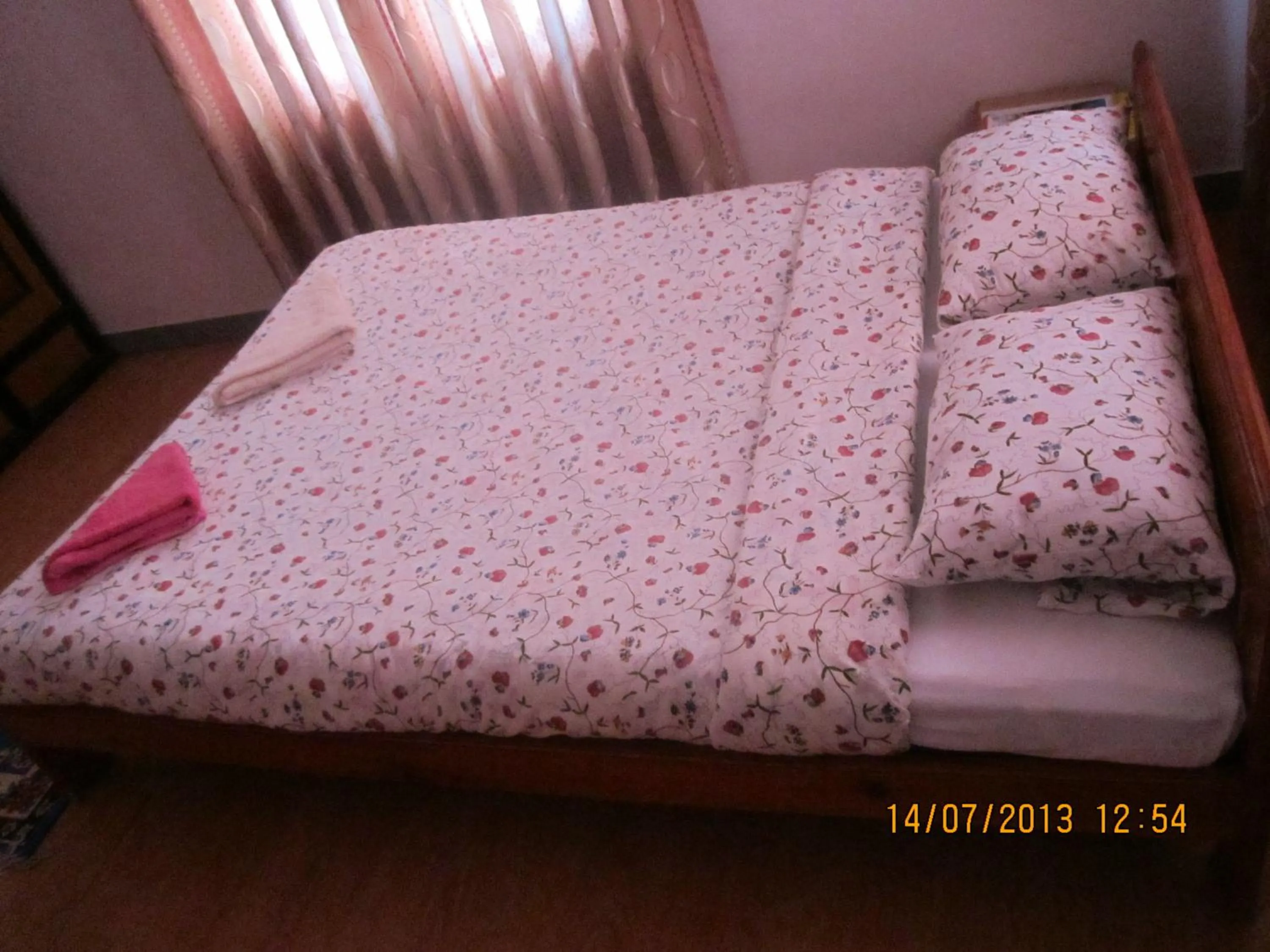 Bed in Le Rhododendron Chambres D'hotes