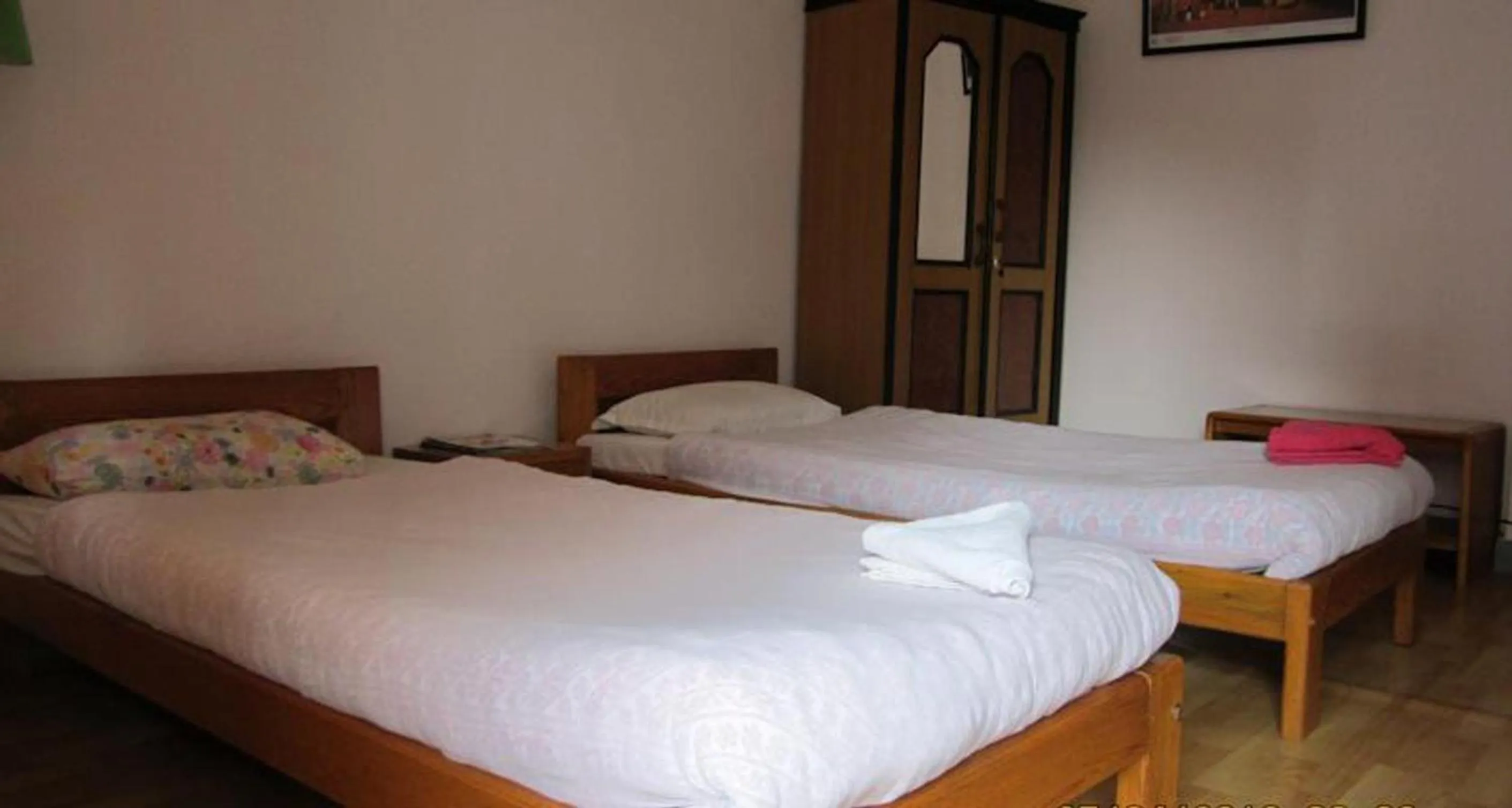 Bed in Le Rhododendron Chambres D'hotes