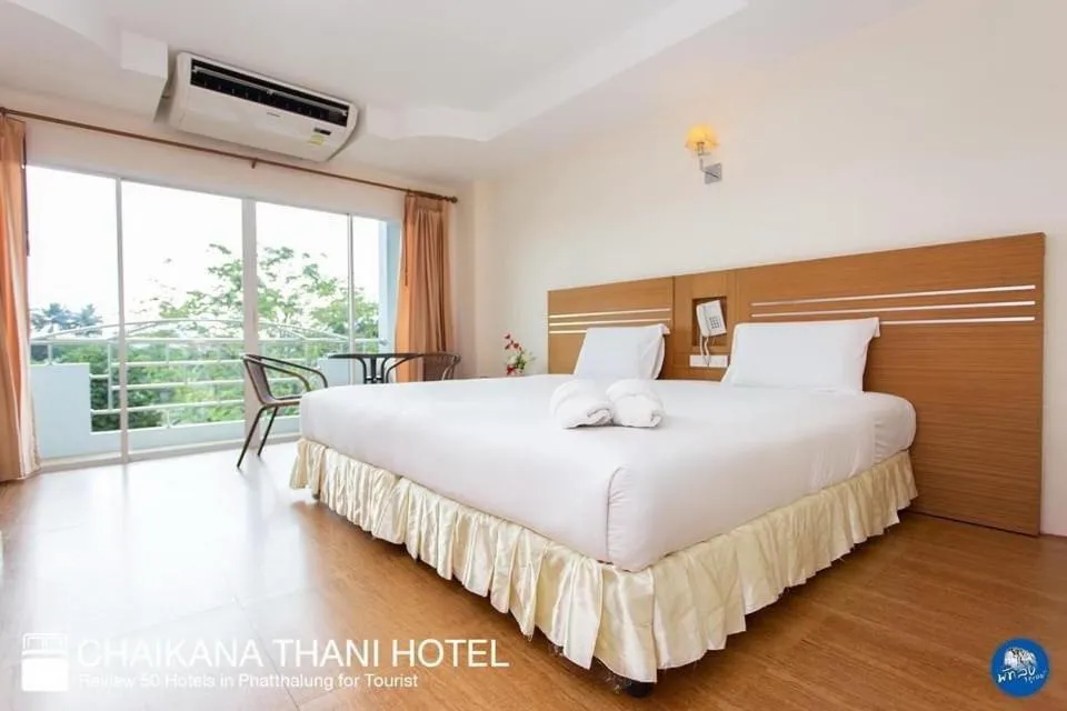 Bed in Chaikana Thani Hotel