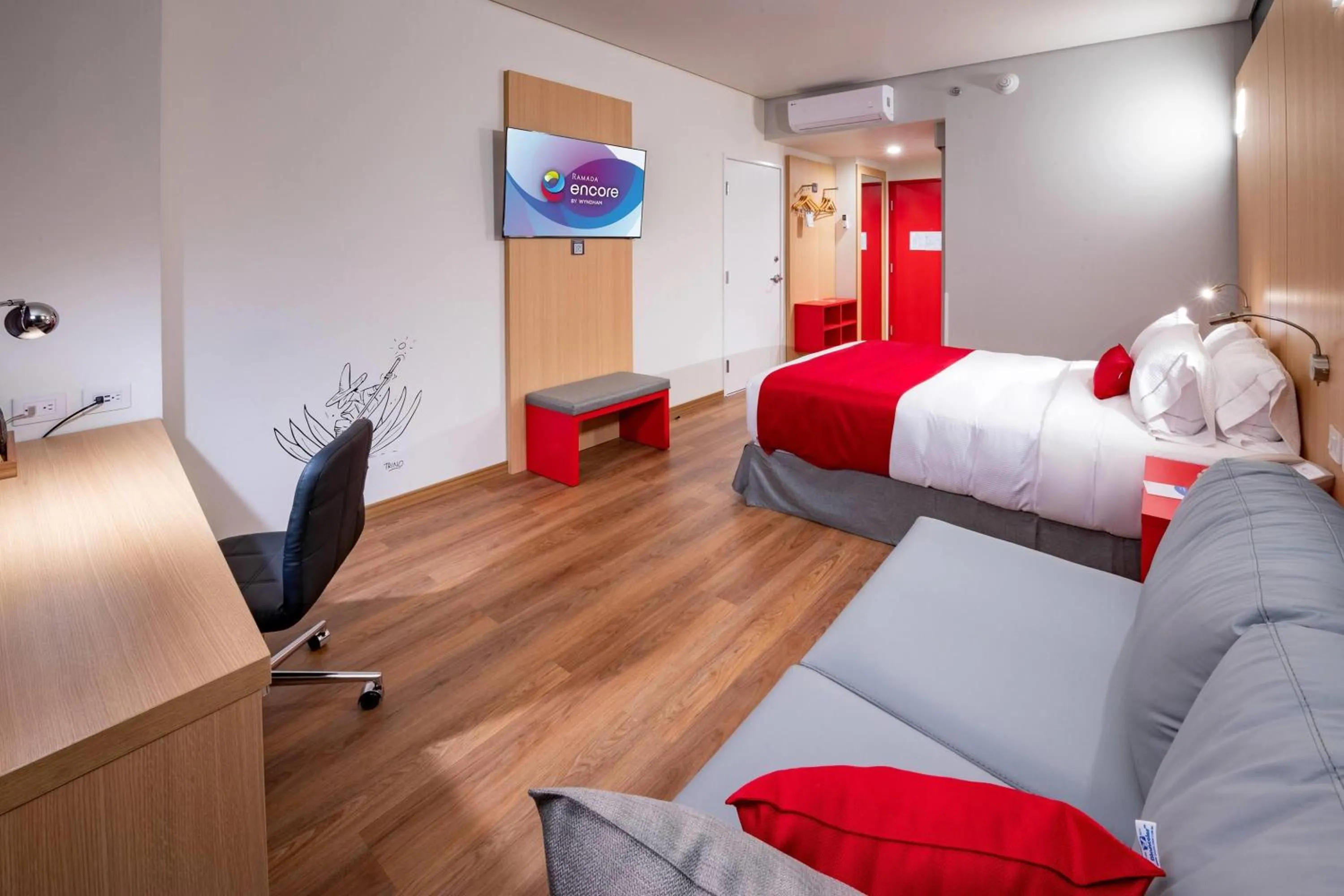 Photo of the whole room, Bed in Ramada Encore by Wyndham Guadalajara Aeropuerto