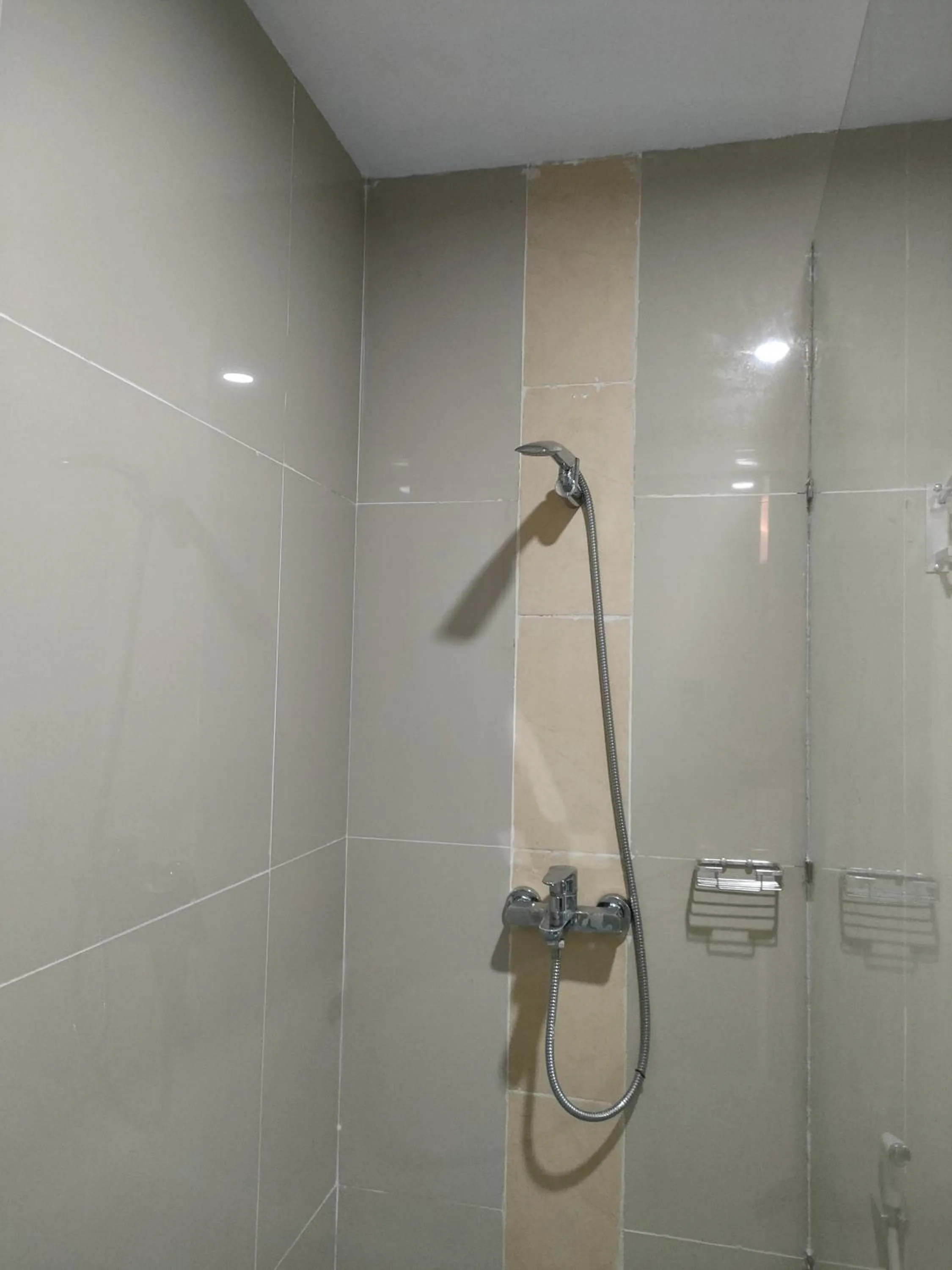 Bathroom in Golden Ganesha Hotel Yogyakarta by Ecommerceloka