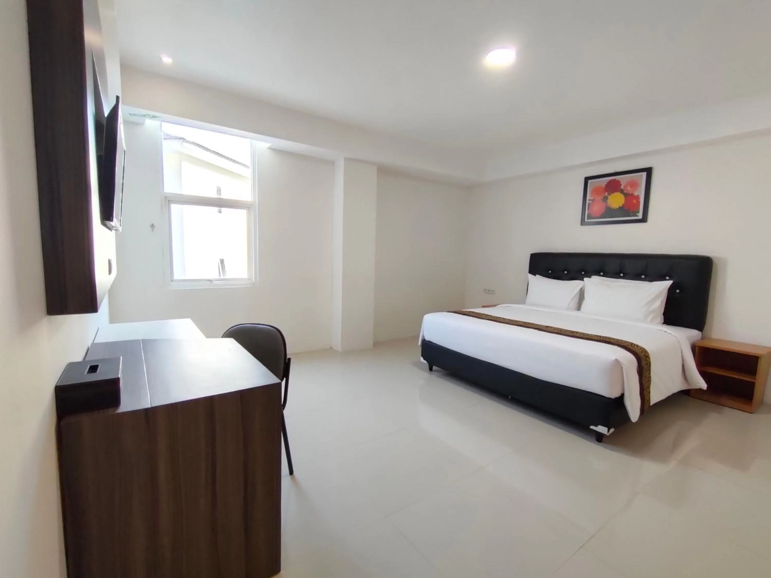 Bed in Golden Ganesha Hotel Yogyakarta by Ecommerceloka