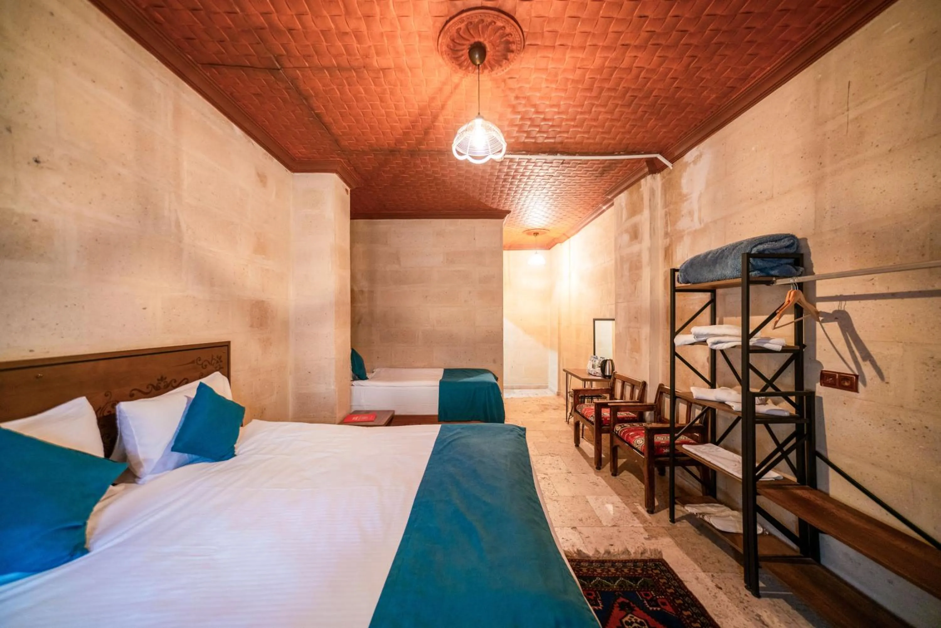 Bed in Azalea Terrace Cave Hotel