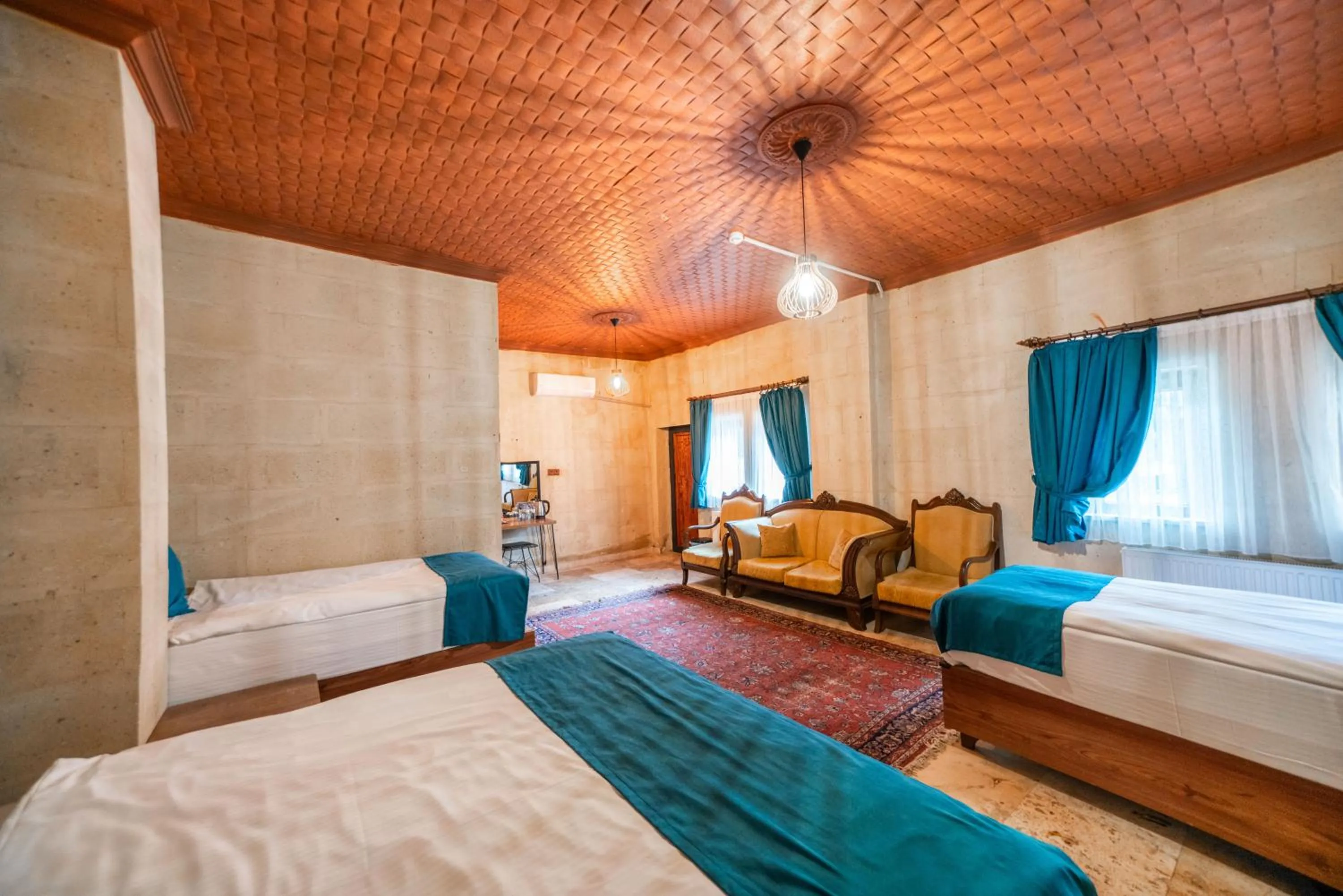 Bed in Azalea Terrace Cave Hotel