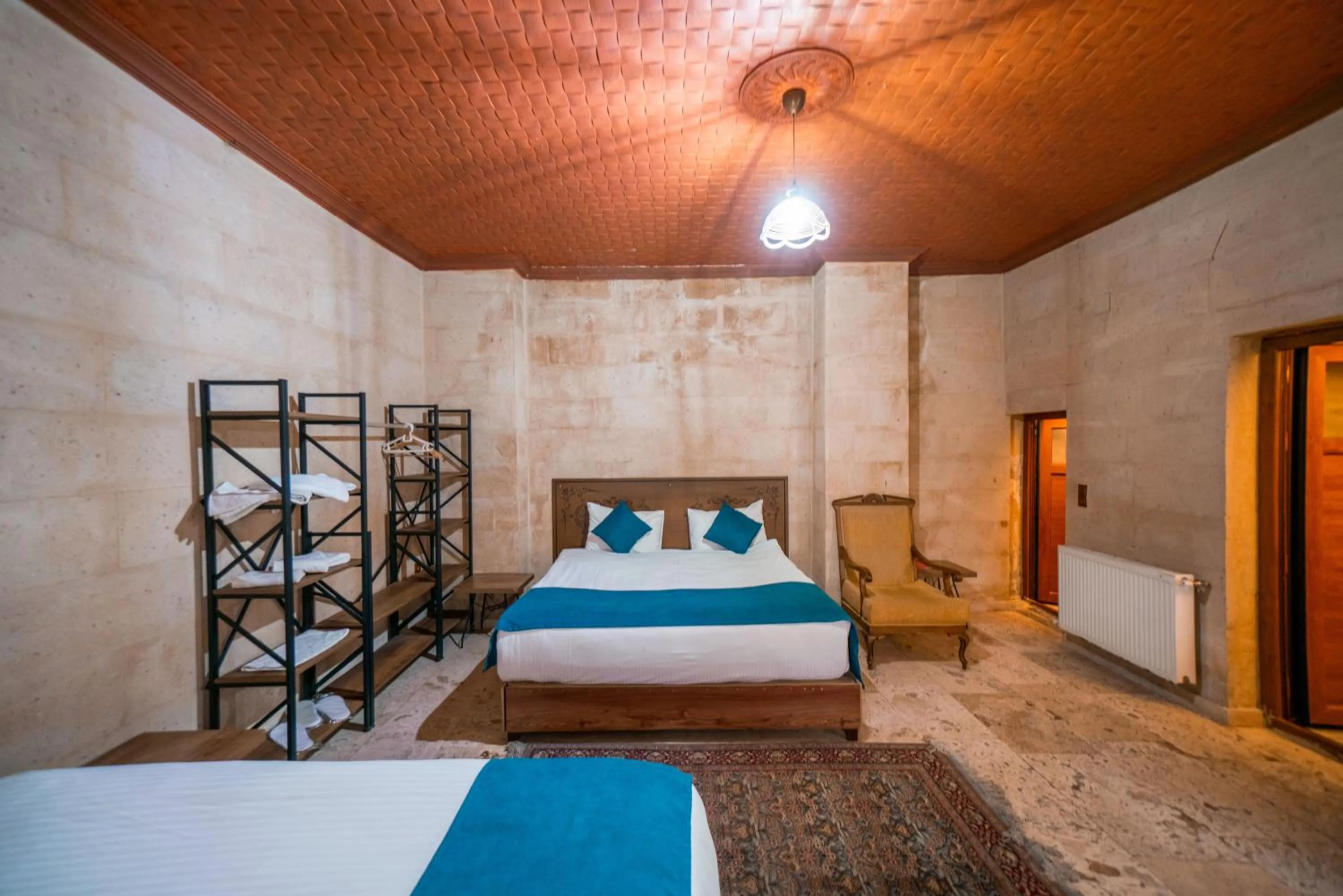 Bed in Azalea Terrace Cave Hotel