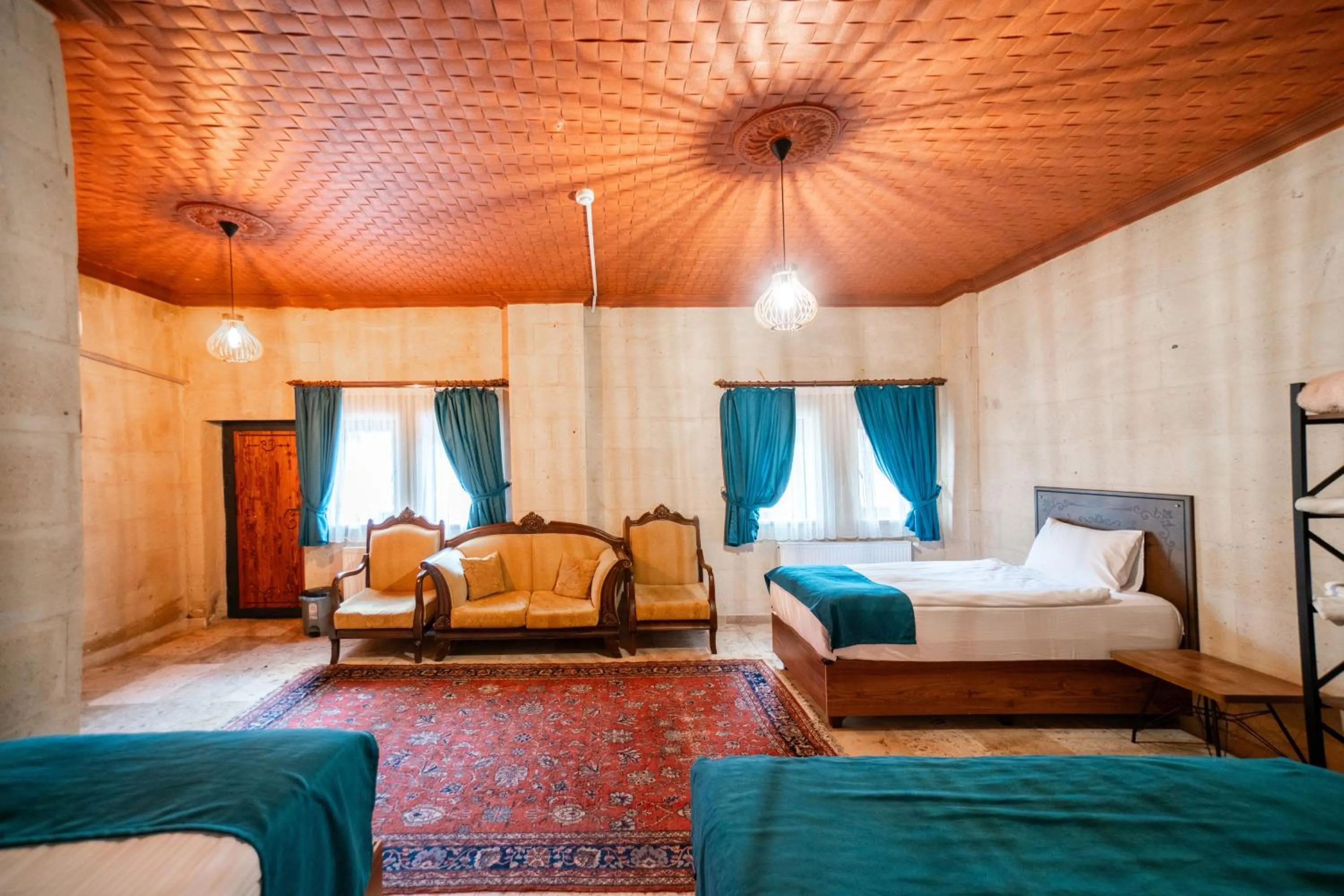 Bed in Azalea Terrace Cave Hotel