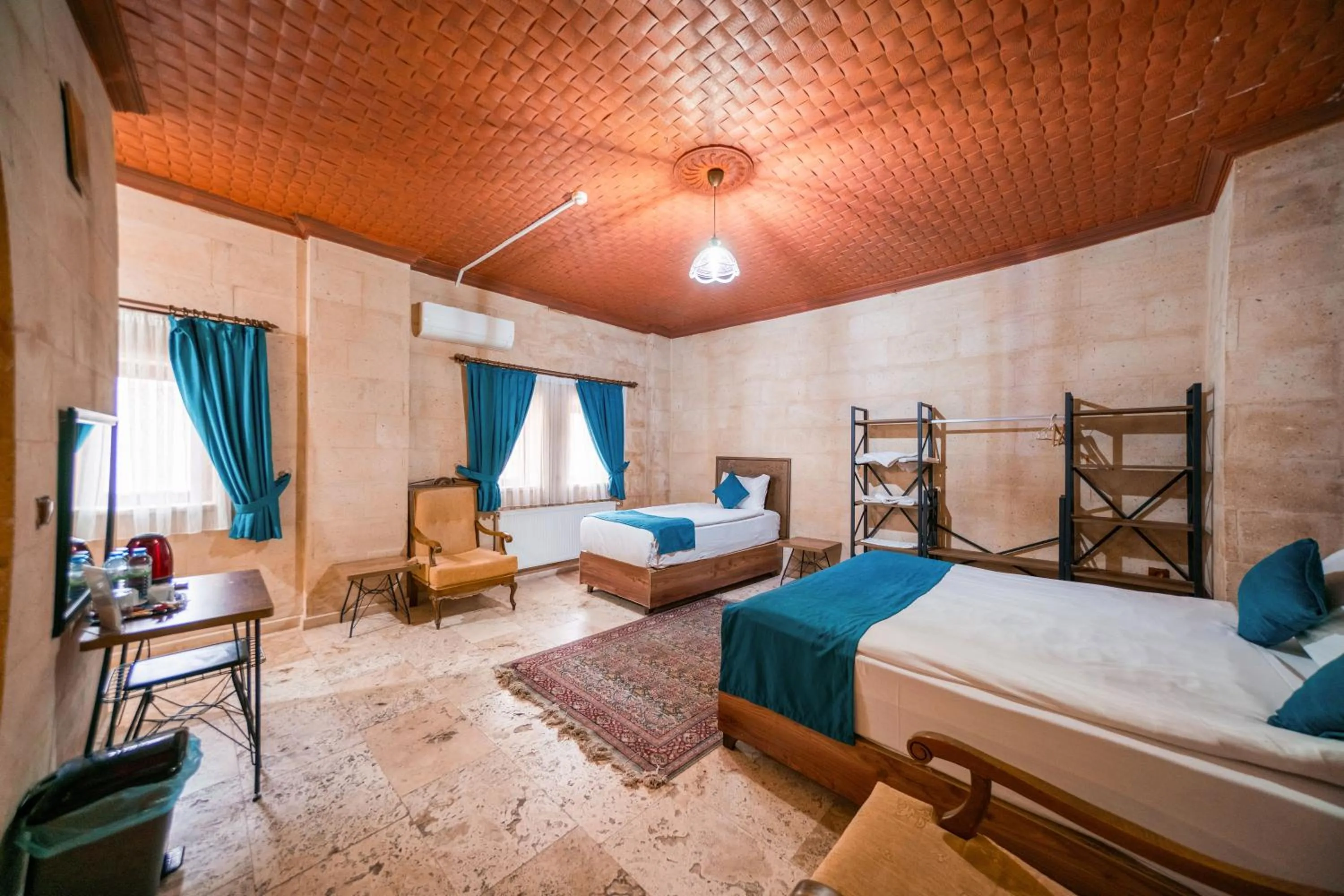 Bed in Azalea Terrace Cave Hotel