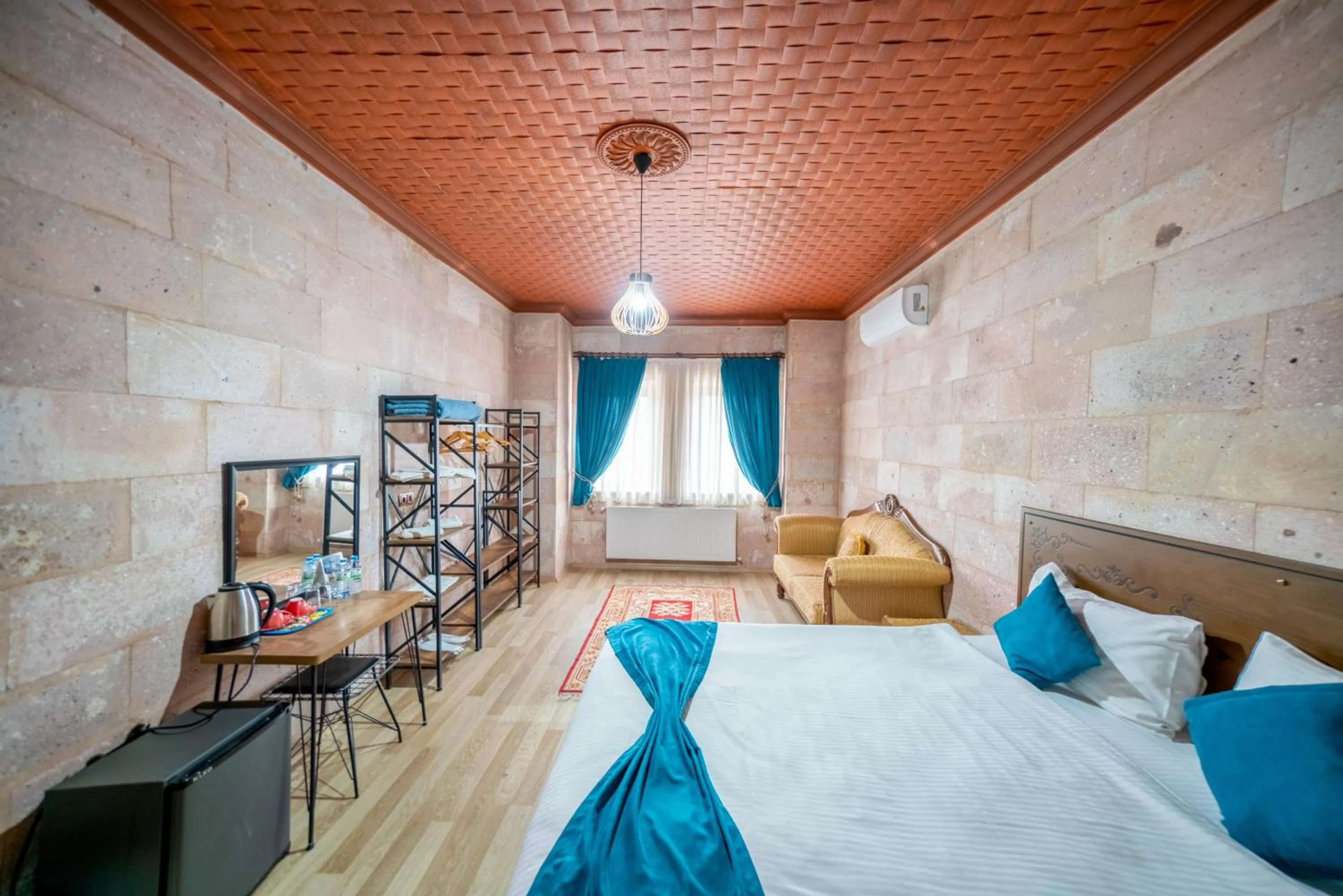 Bed in Azalea Terrace Cave Hotel