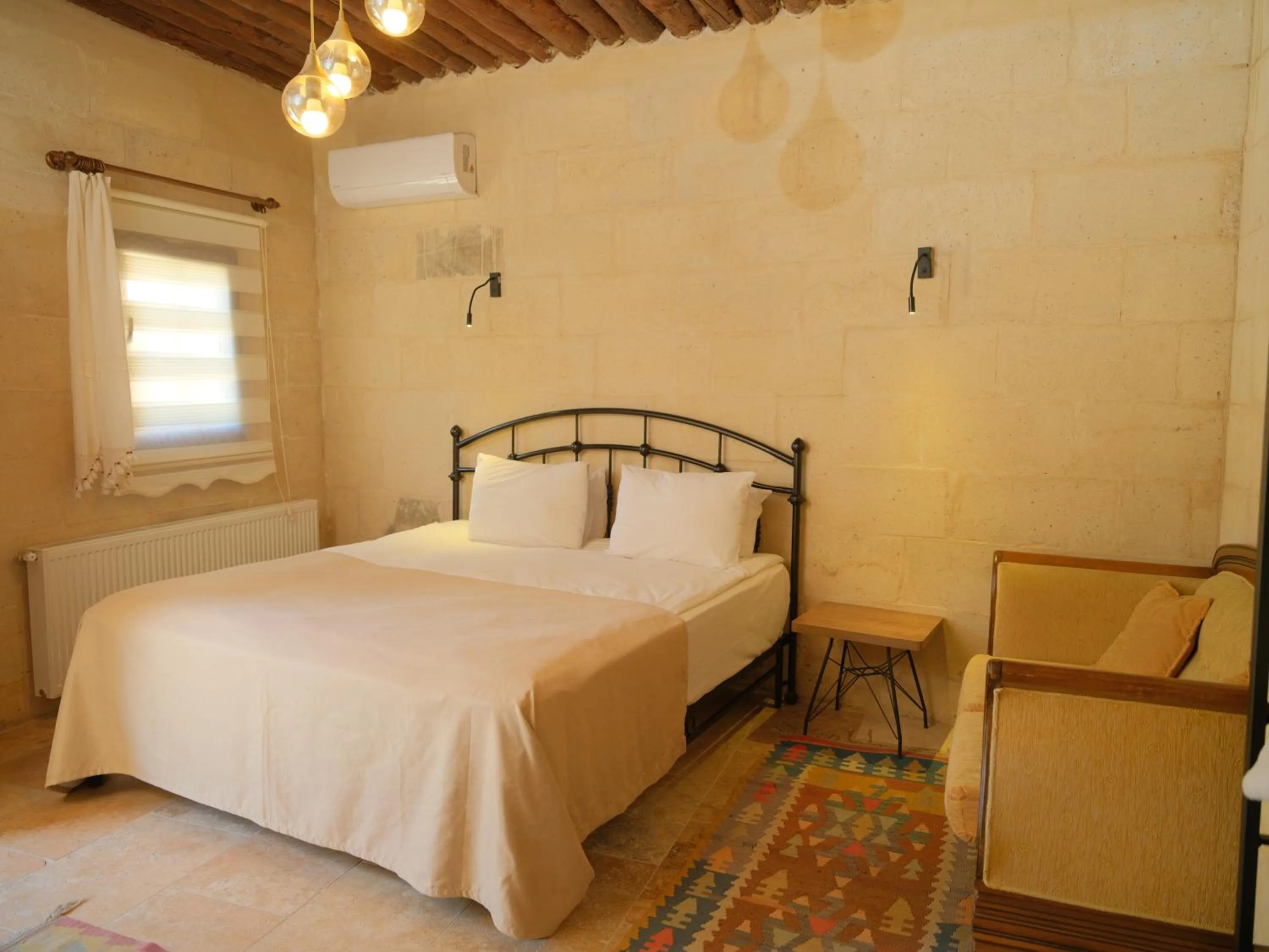 Photo of the whole room, Bed in Azalea Terrace Cave Hotel