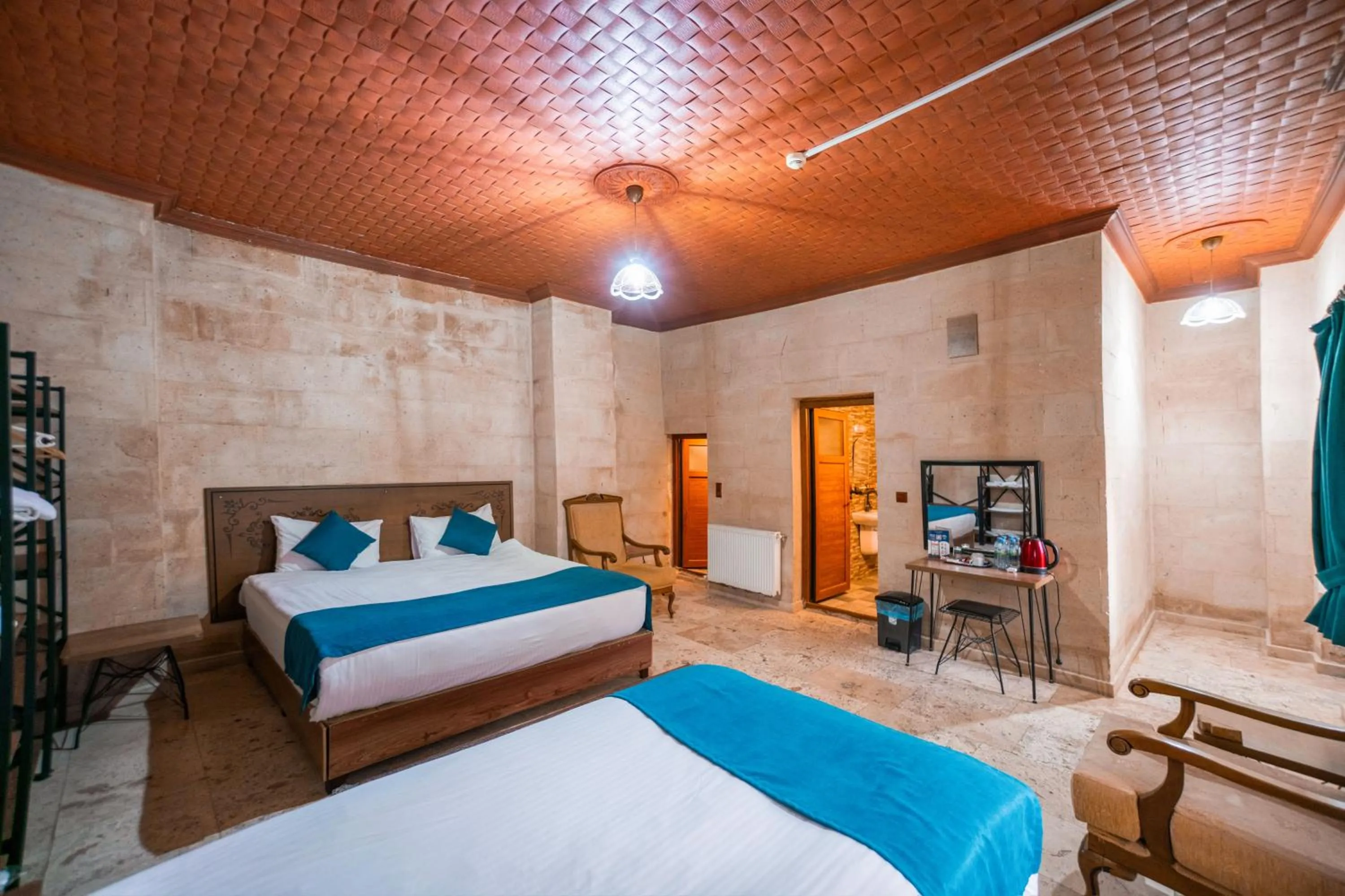 Bed in Azalea Terrace Cave Hotel