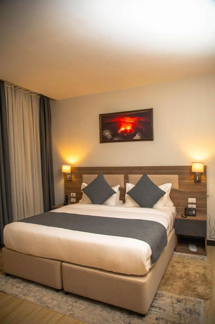 Bedroom, Bed in Triple E Hotel and Spa