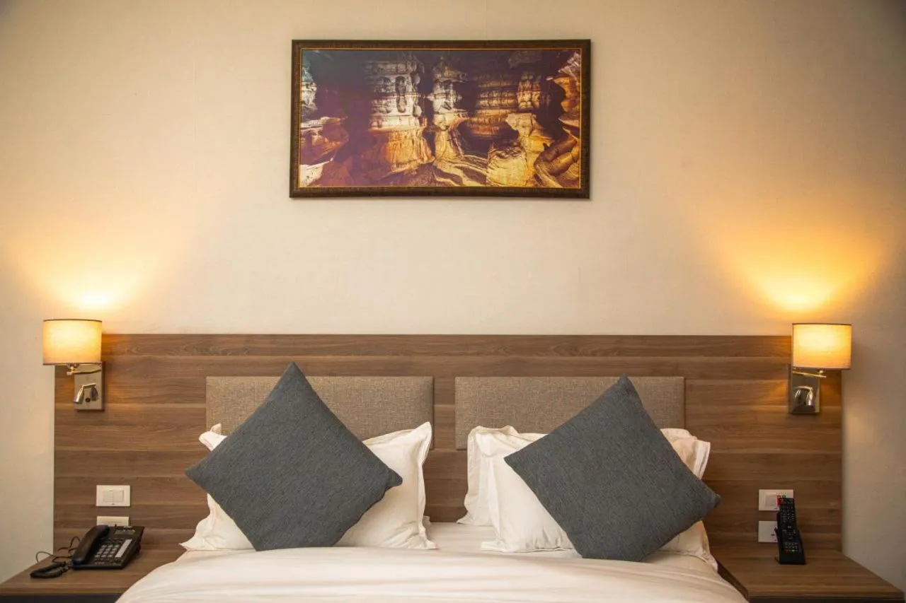 Shower, Bed in Triple E Hotel and Spa