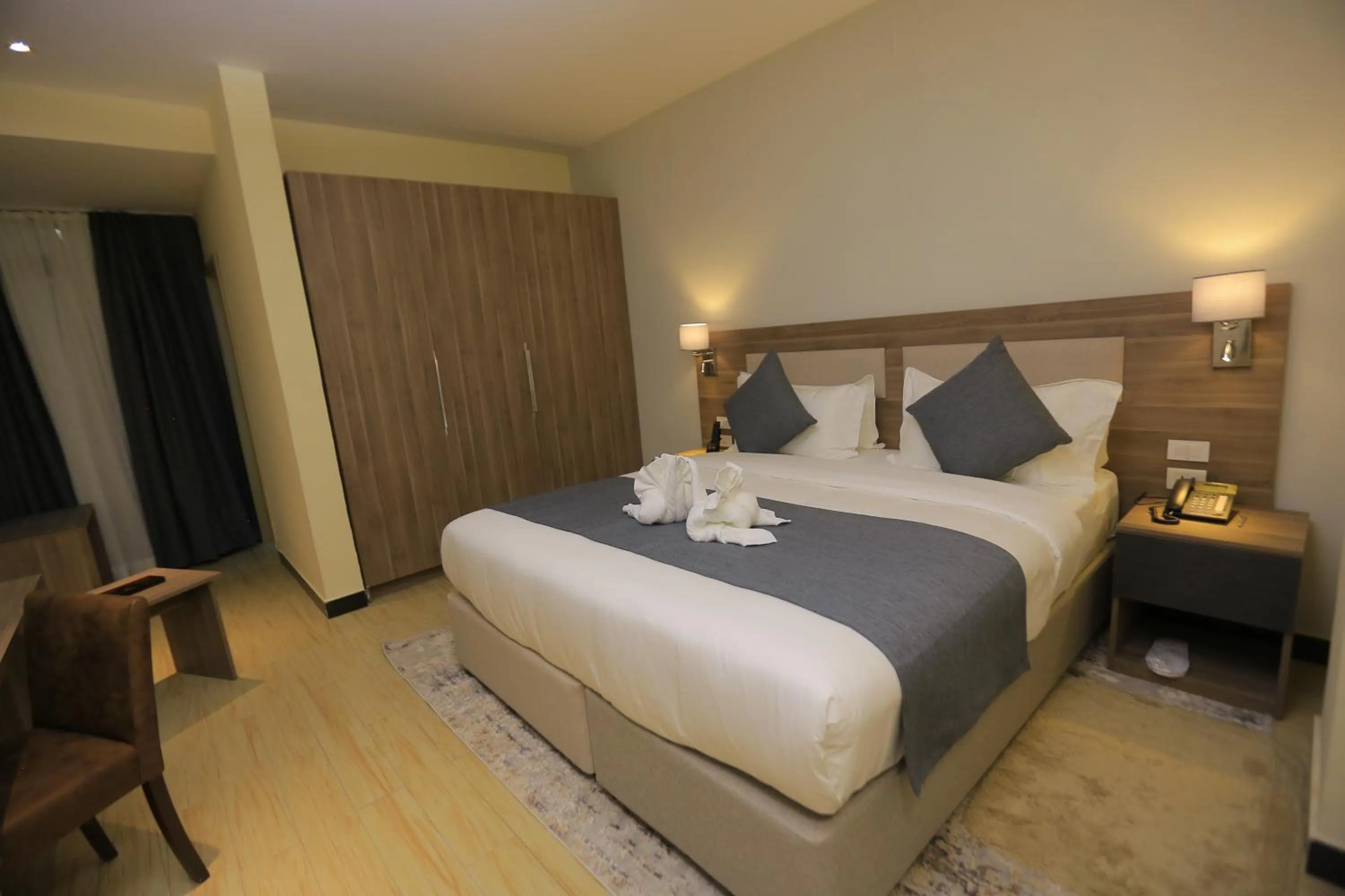 Bed in Triple E Hotel and Spa