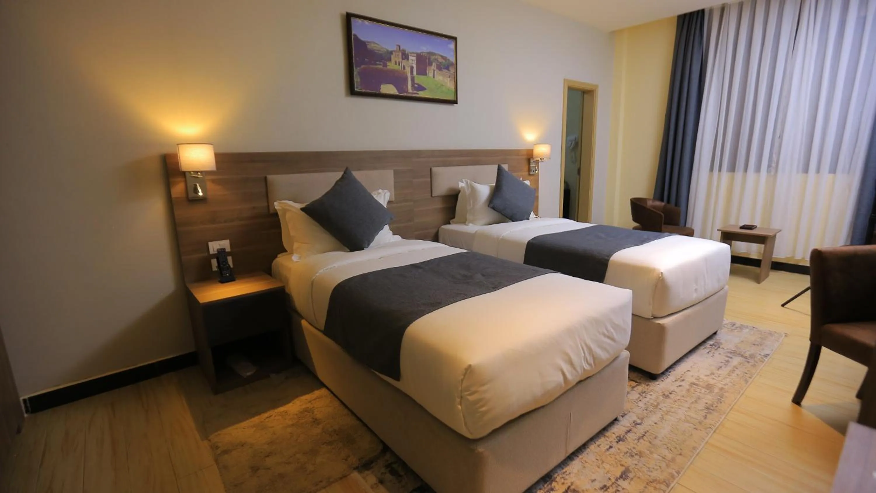 Bed in Triple E Hotel and Spa