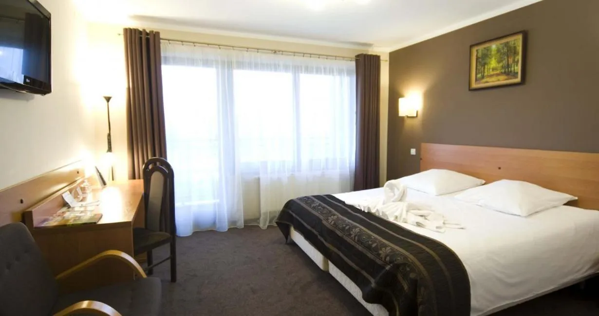 Bed in Hotel Zimnik Luksus Natury Spa & Wellness