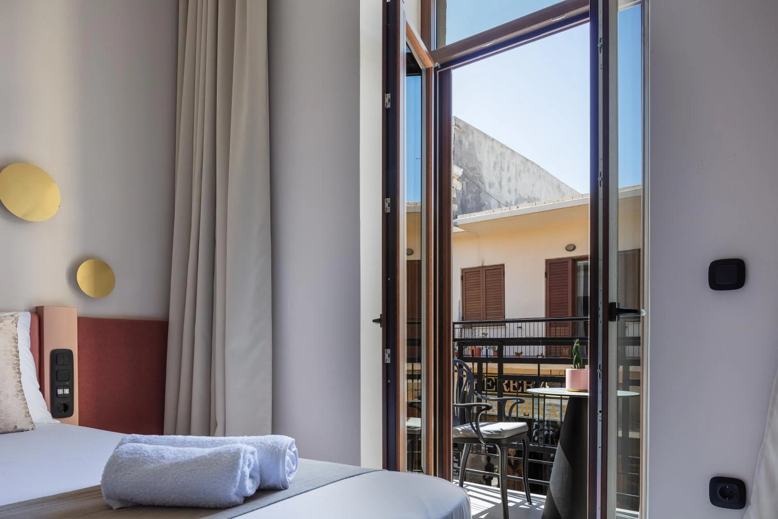 Balcony/Terrace, Bed in Omma Suites