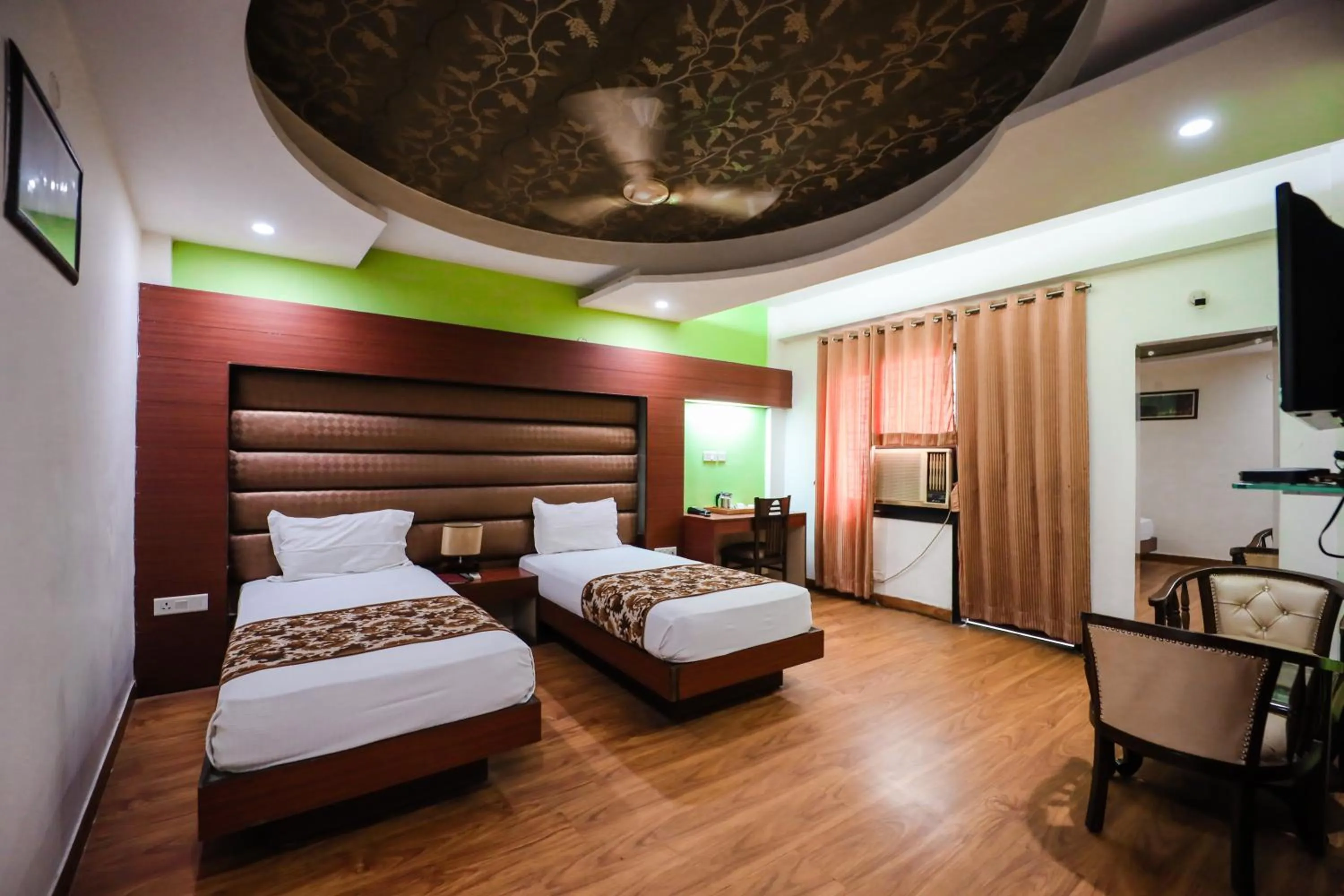 Bed in HOMANSH GALAXY HOTEL