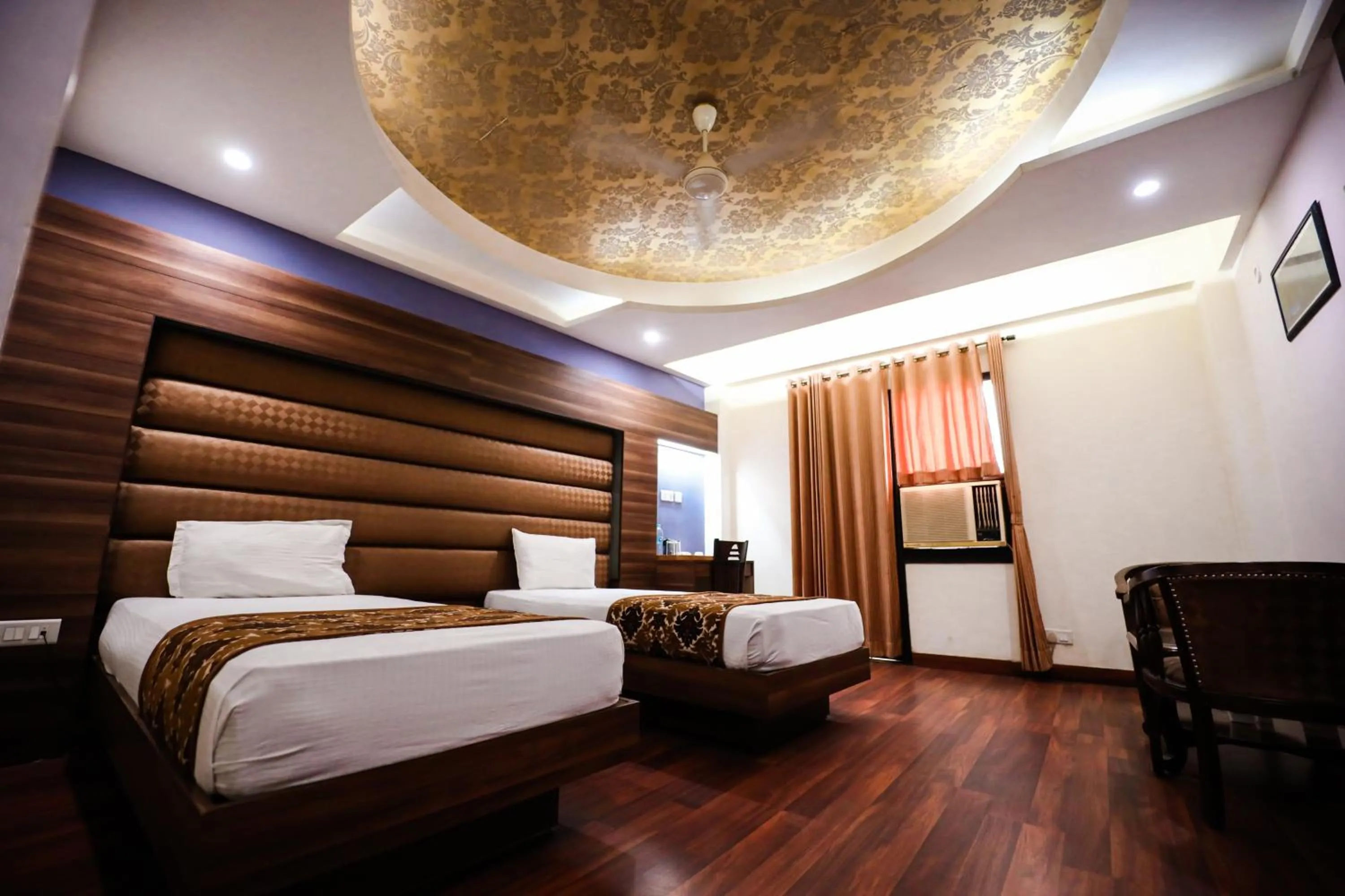 Photo of the whole room, Bed in HOMANSH GALAXY HOTEL