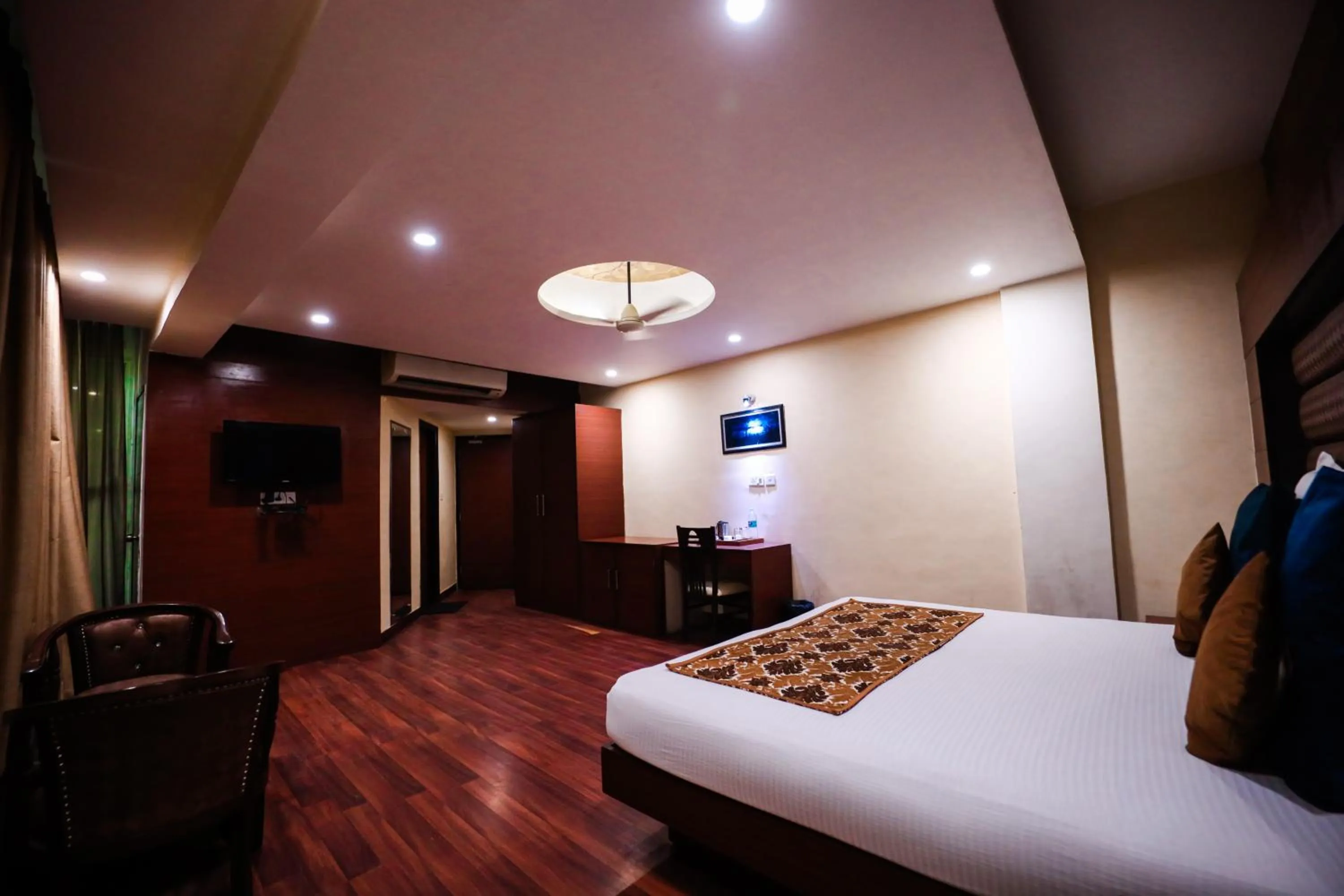 Photo of the whole room, Bed in HOMANSH GALAXY HOTEL
