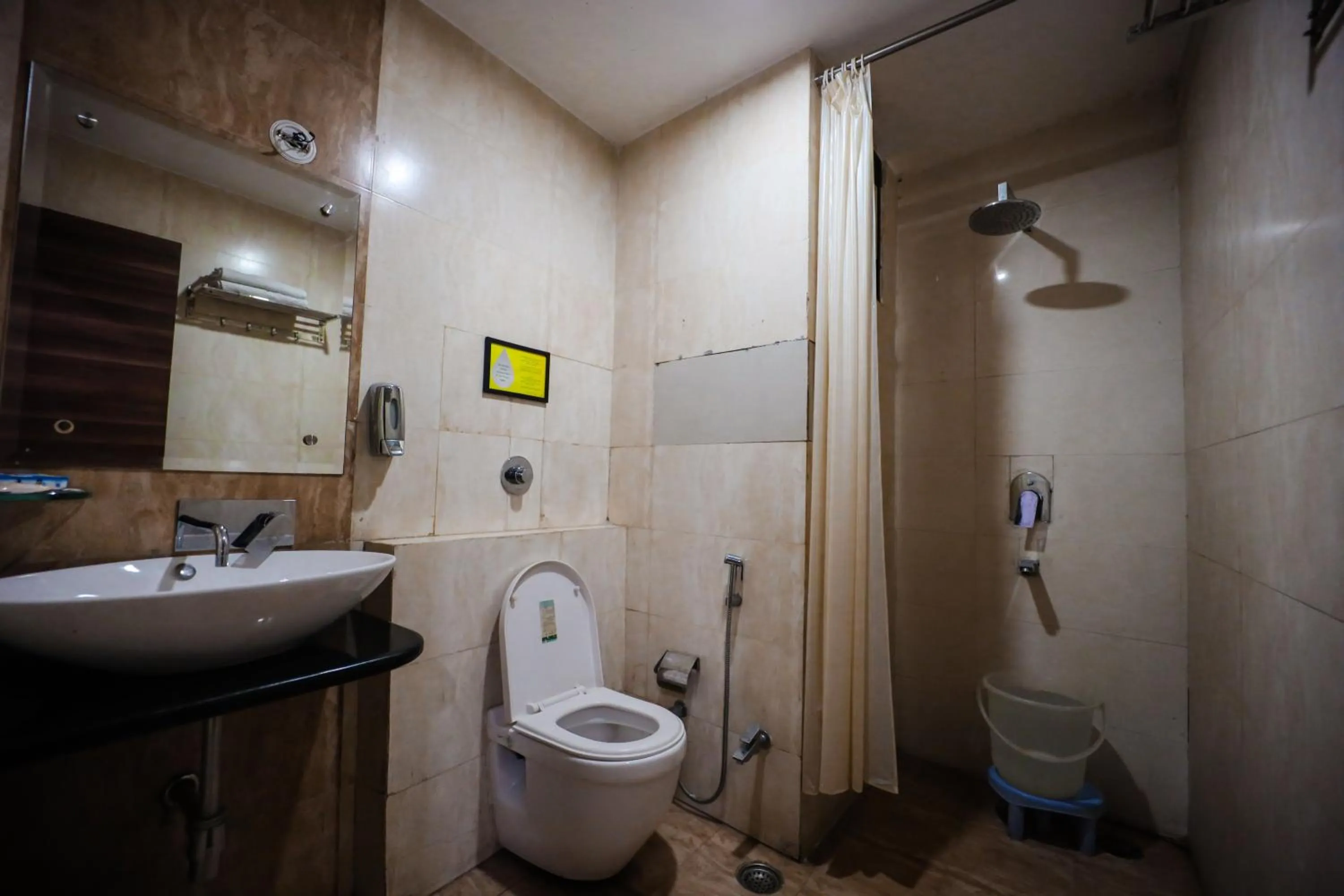 Bathroom in HOMANSH GALAXY HOTEL