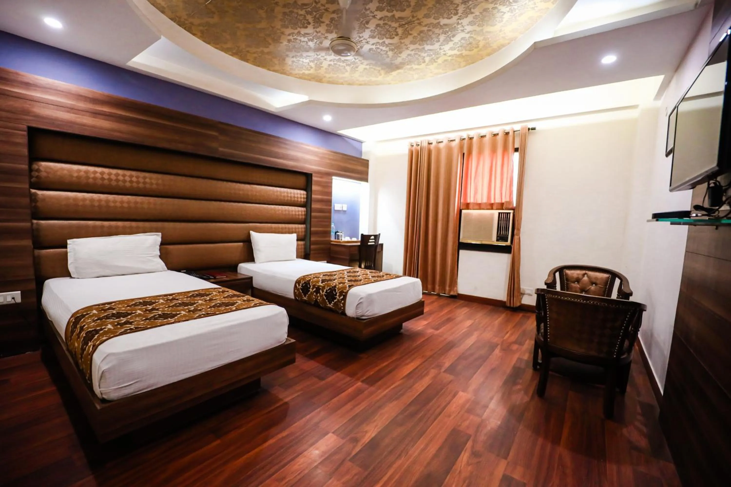Bed in HOMANSH GALAXY HOTEL
