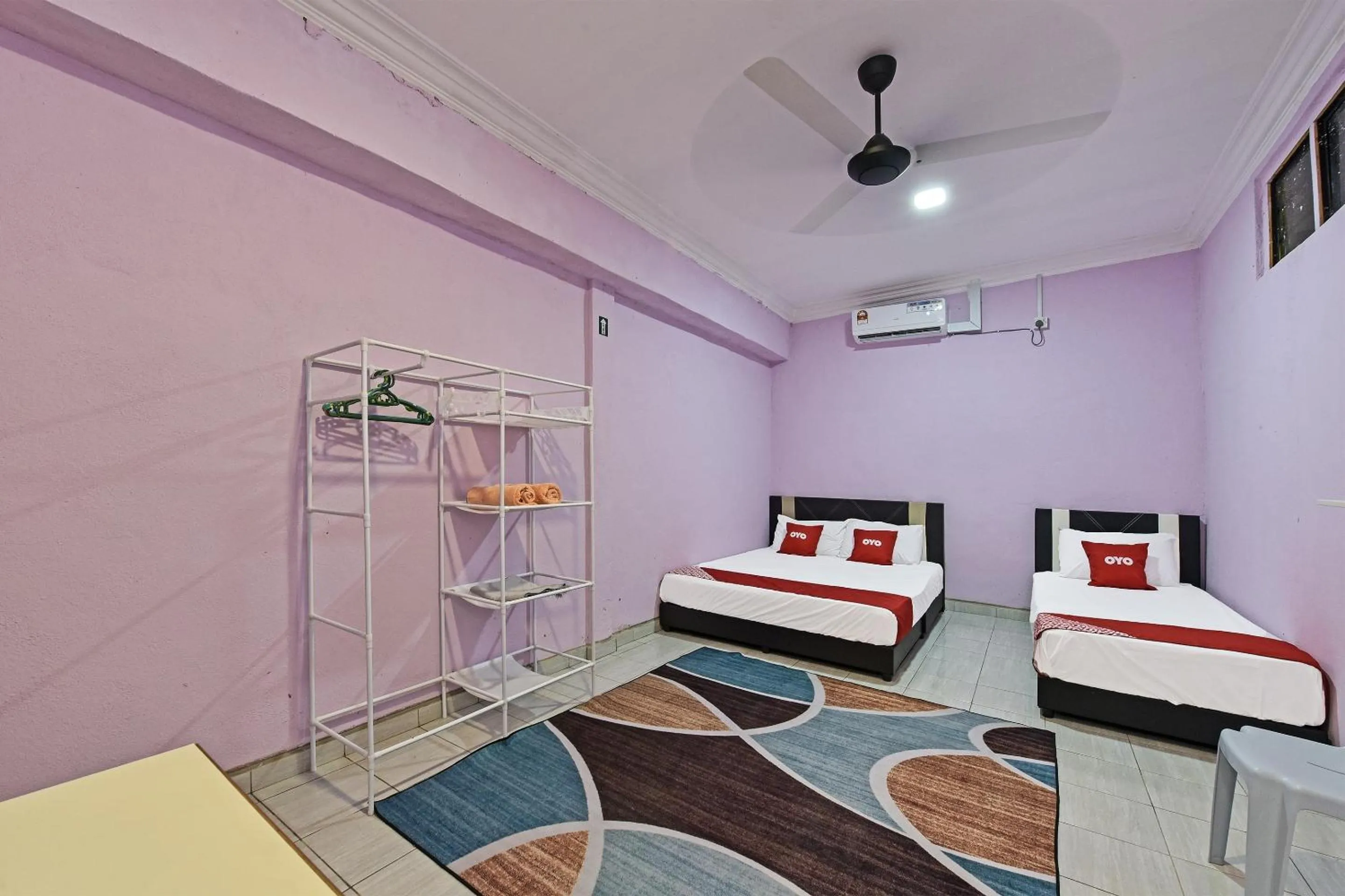 Bedroom, Bed in Hotel O Zn Mix Homestay & Roomstay