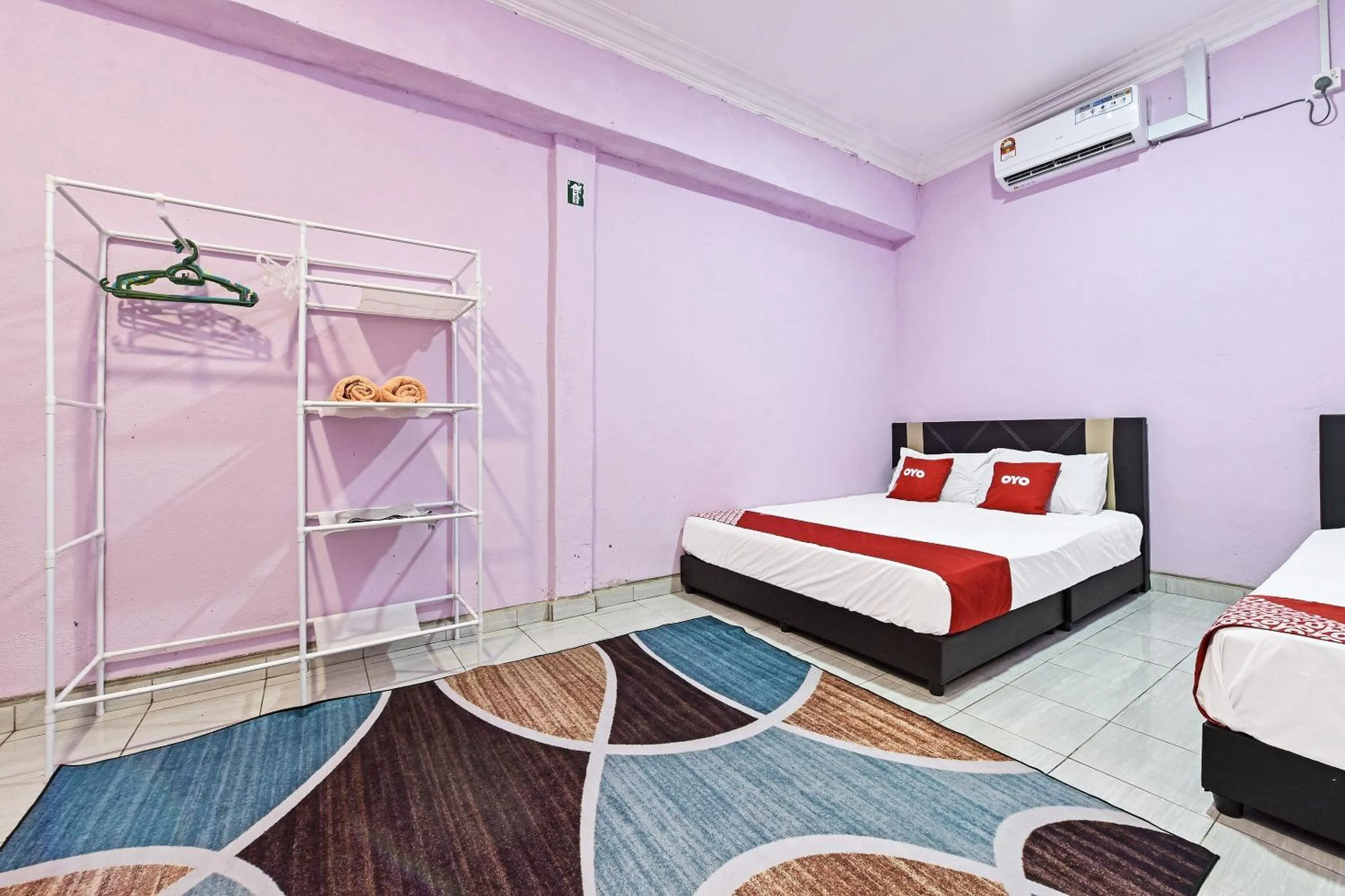 Bedroom, Bed in Hotel O Zn Mix Homestay & Roomstay