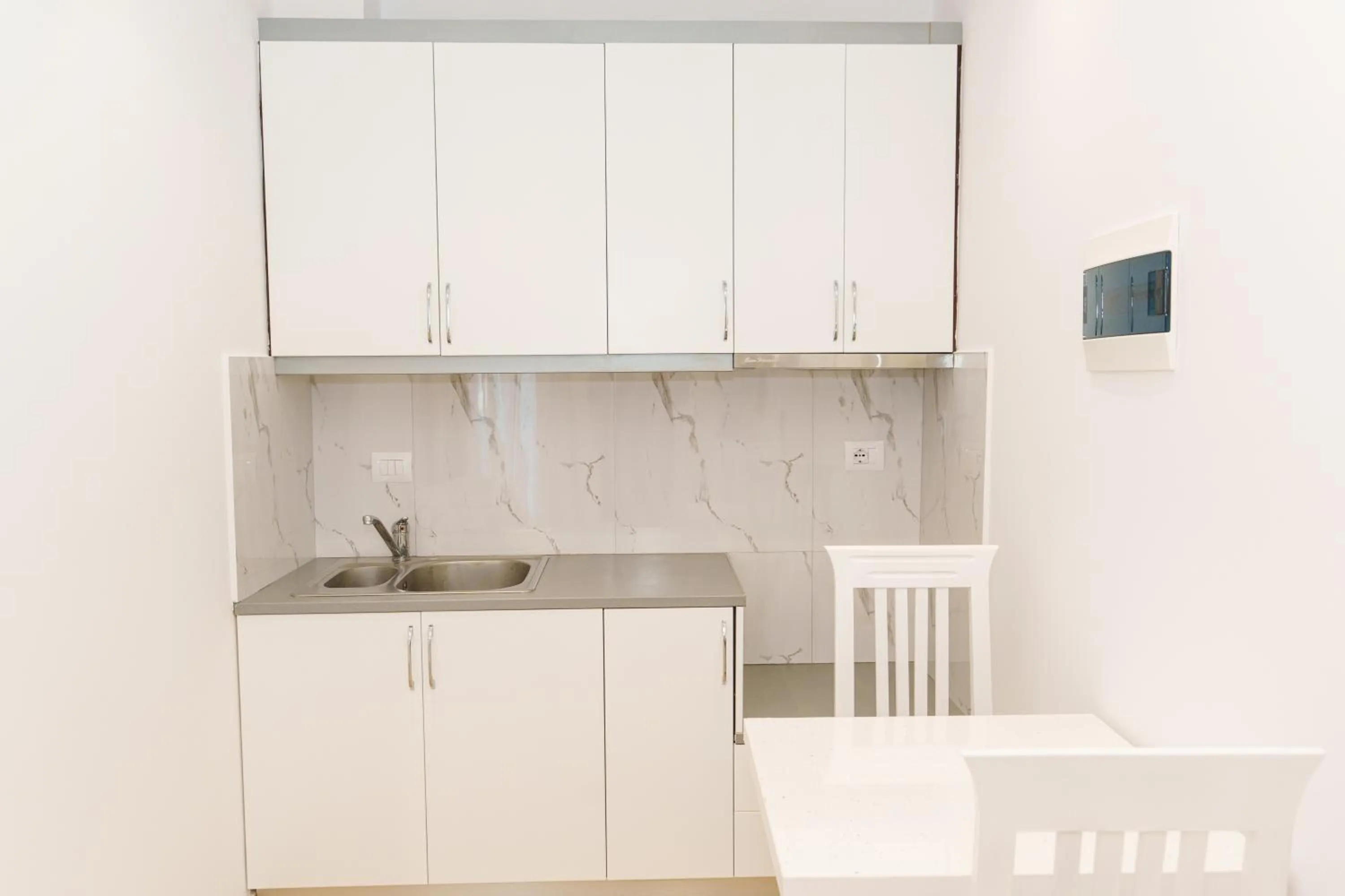 Kitchen or kitchenette in Belmond Hotel