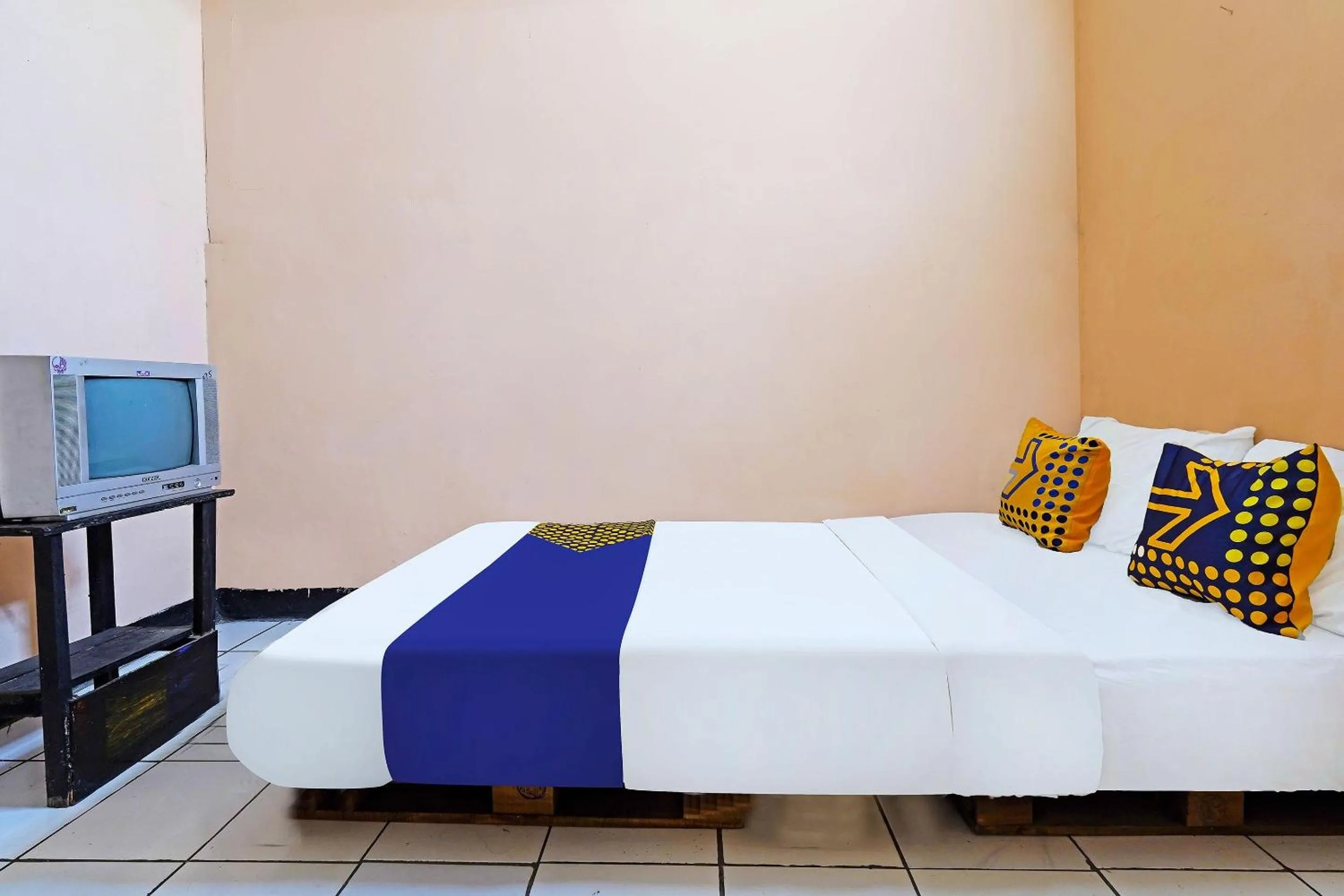 Bedroom in Hotel O Rumah Bundo Syariah