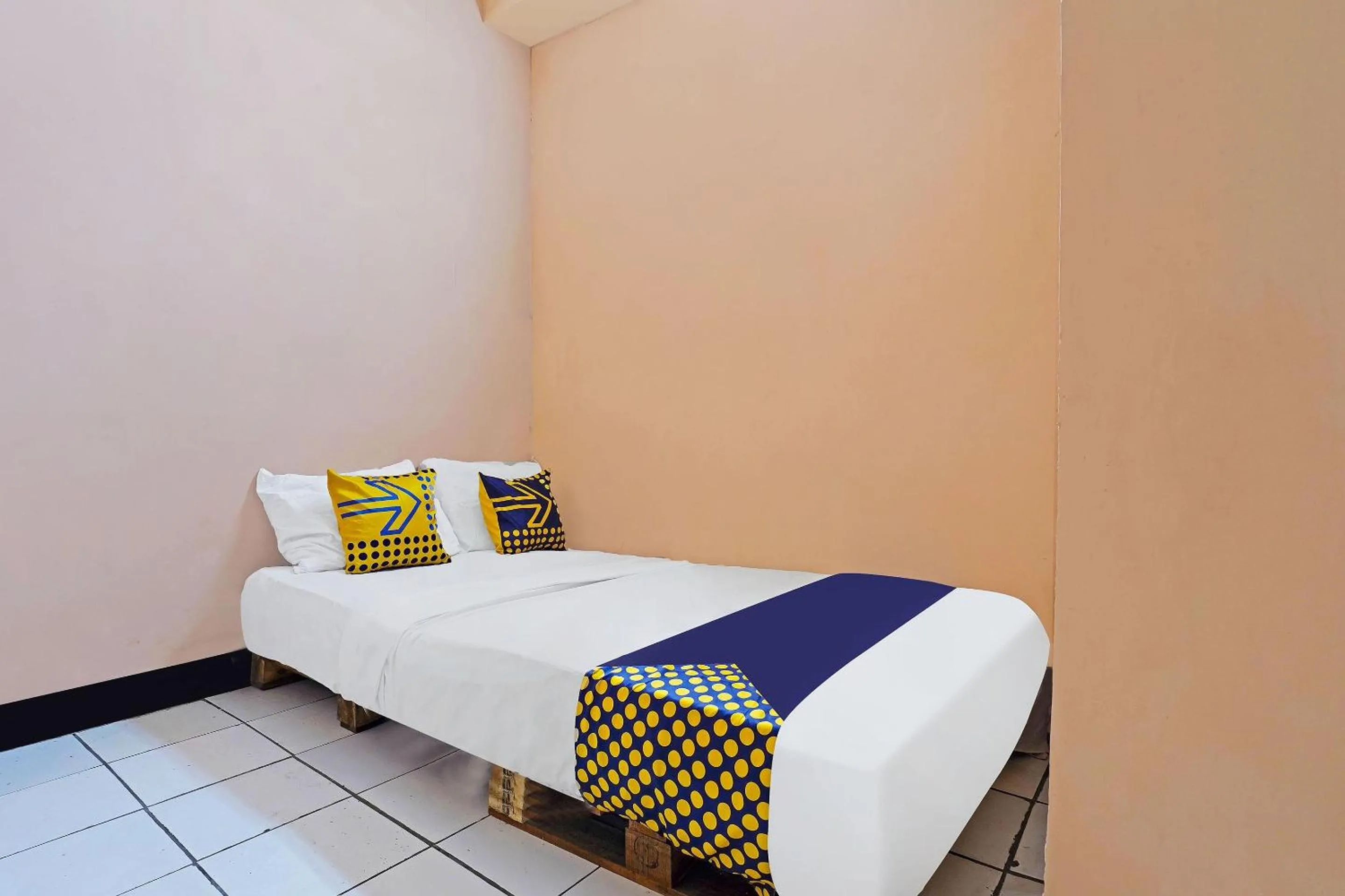 Bedroom in Hotel O Rumah Bundo Syariah