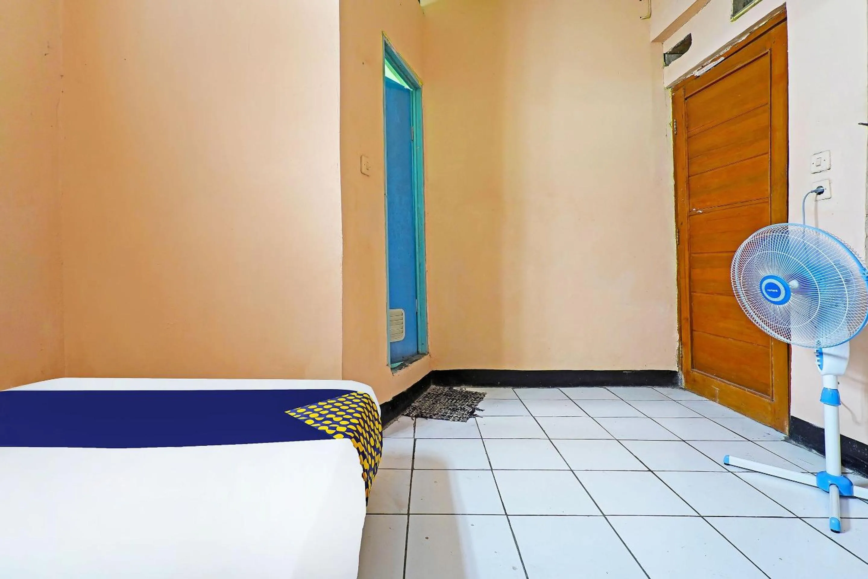 Bedroom in Hotel O Rumah Bundo Syariah