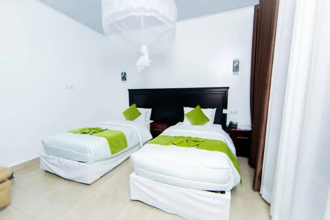 Double Room with Private Bathroom - single occupancy in INZOZI AFRICA HOUSE B&B-Gishushu Double Room with Private Bathroom - single occupancy in INZOZI AFRICA HOUSE B&B-Gishushu
