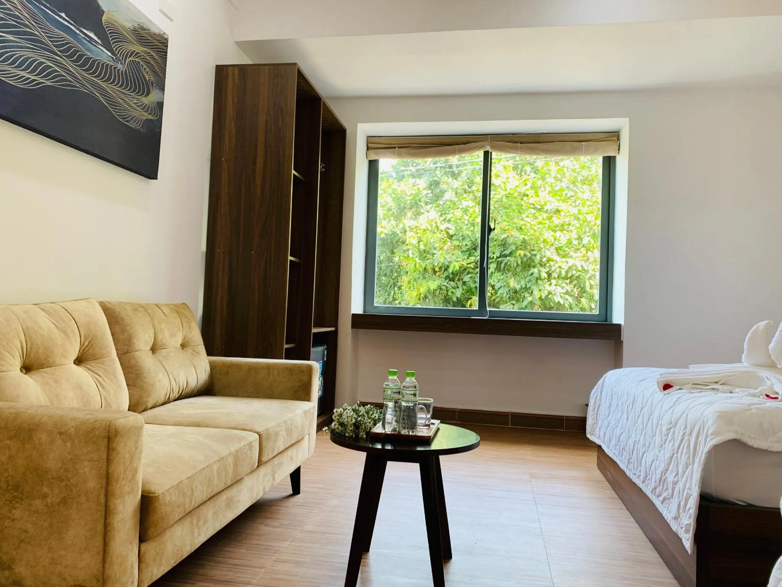 Seating area, Bed in Valentino Homestay Hue