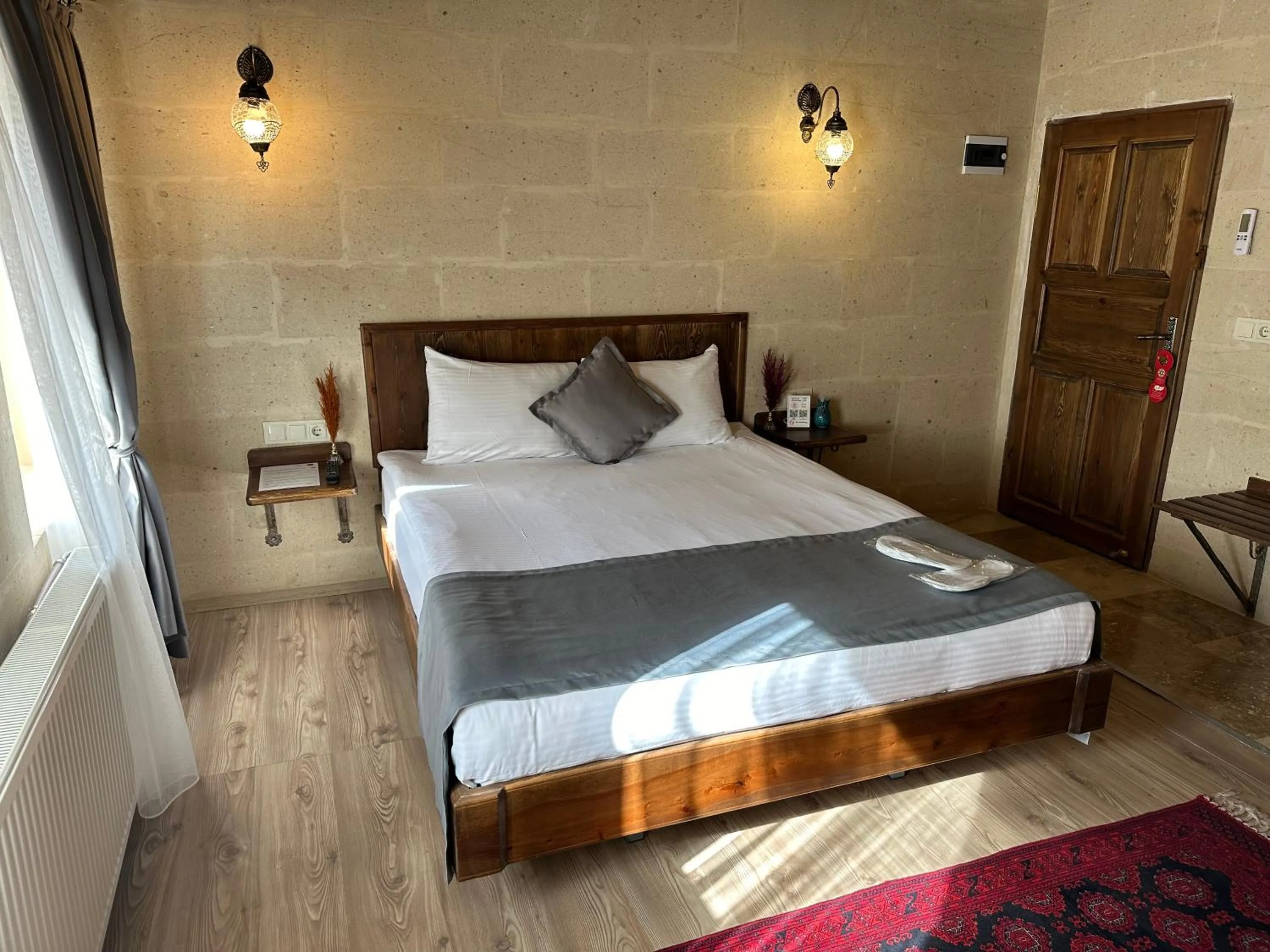 Bed in Virtus Cappadocia Hotel Göreme