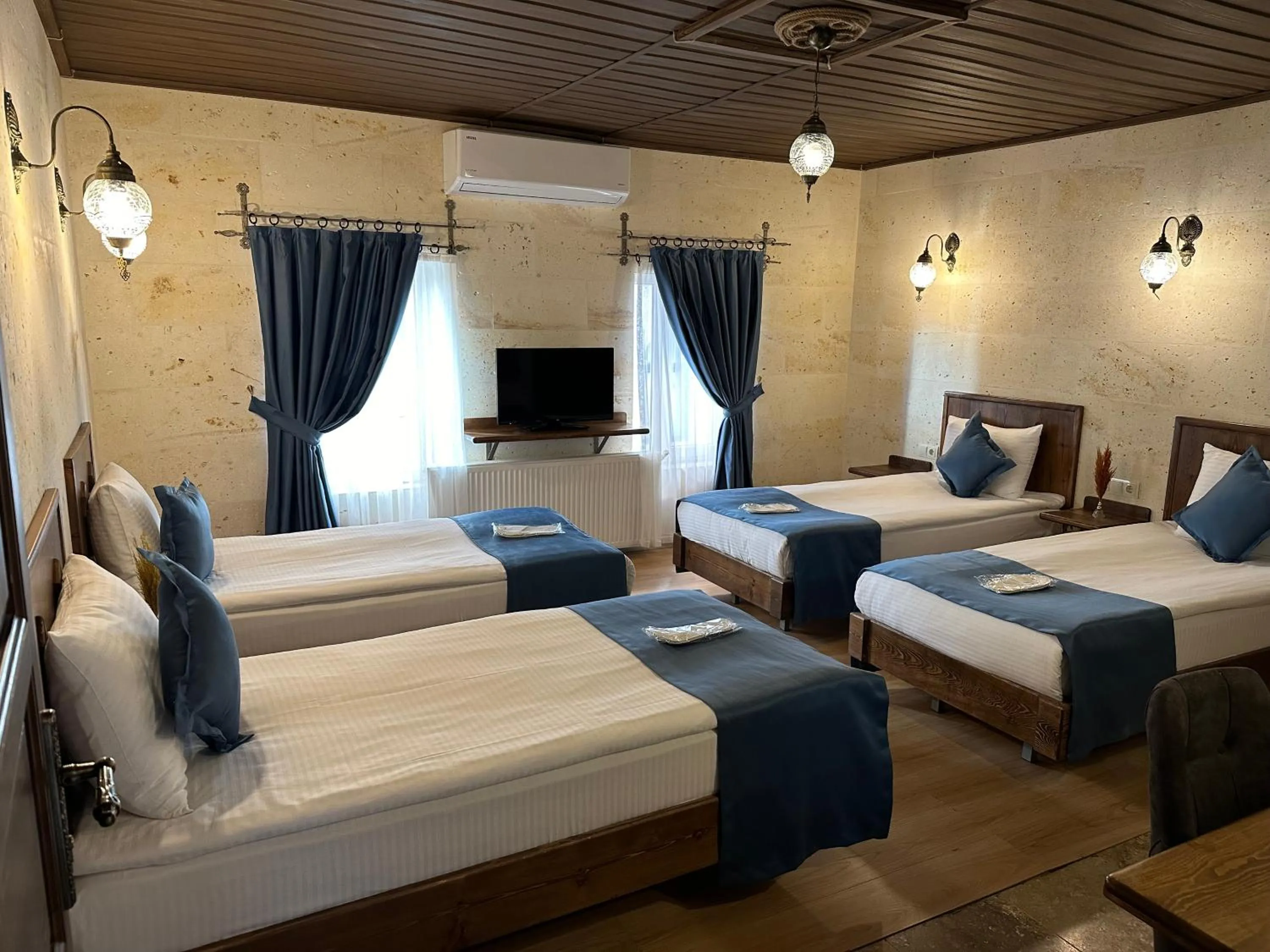 Bed in Virtus Cappadocia Hotel Göreme