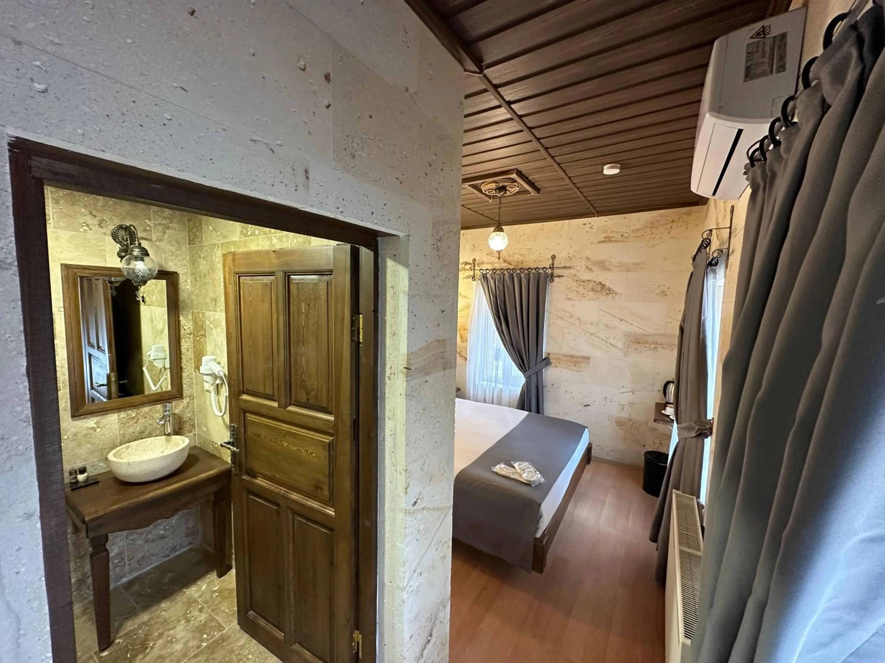 Bed in Virtus Cappadocia Hotel Göreme