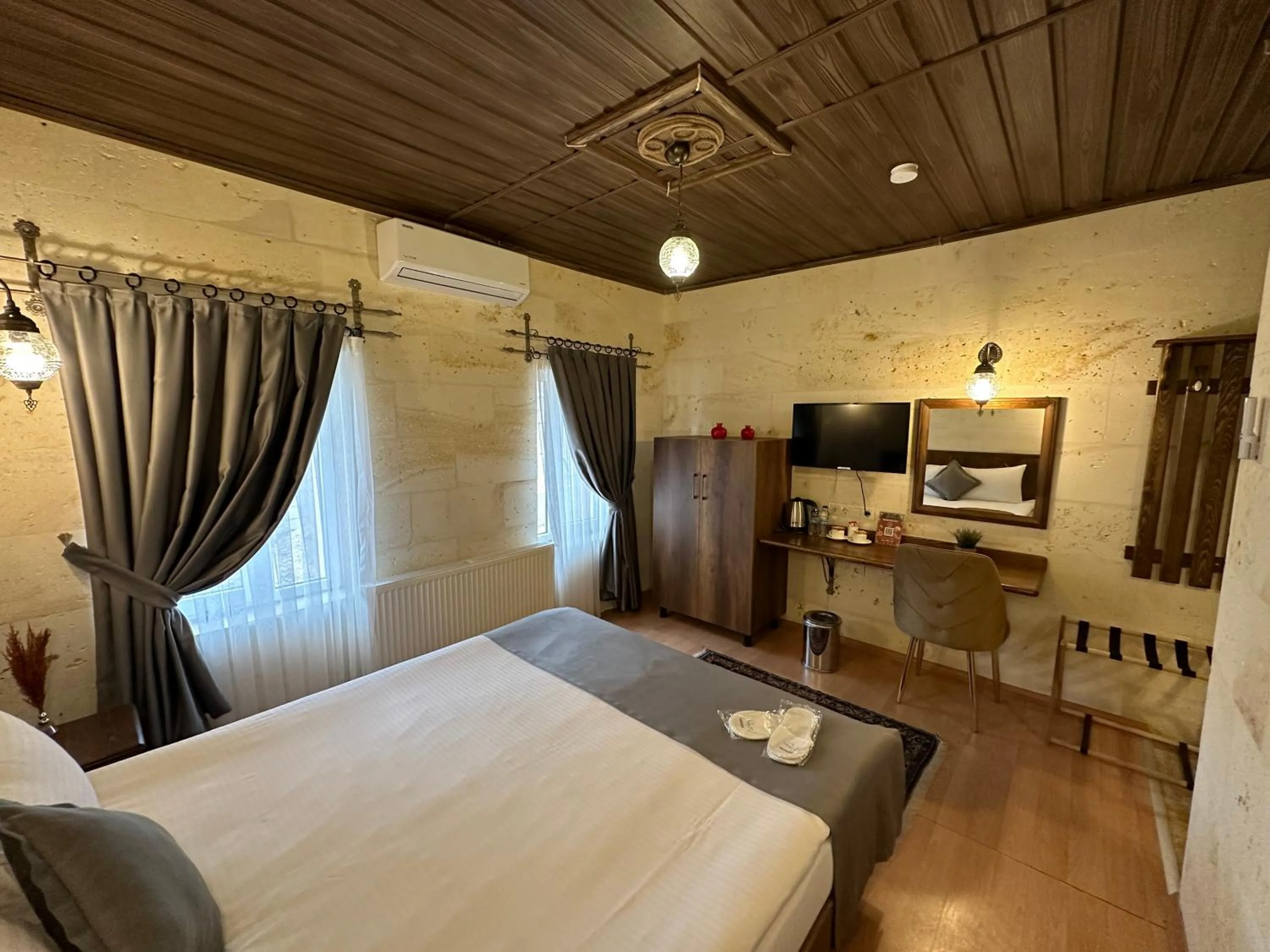 Bed in Virtus Cappadocia Hotel Göreme